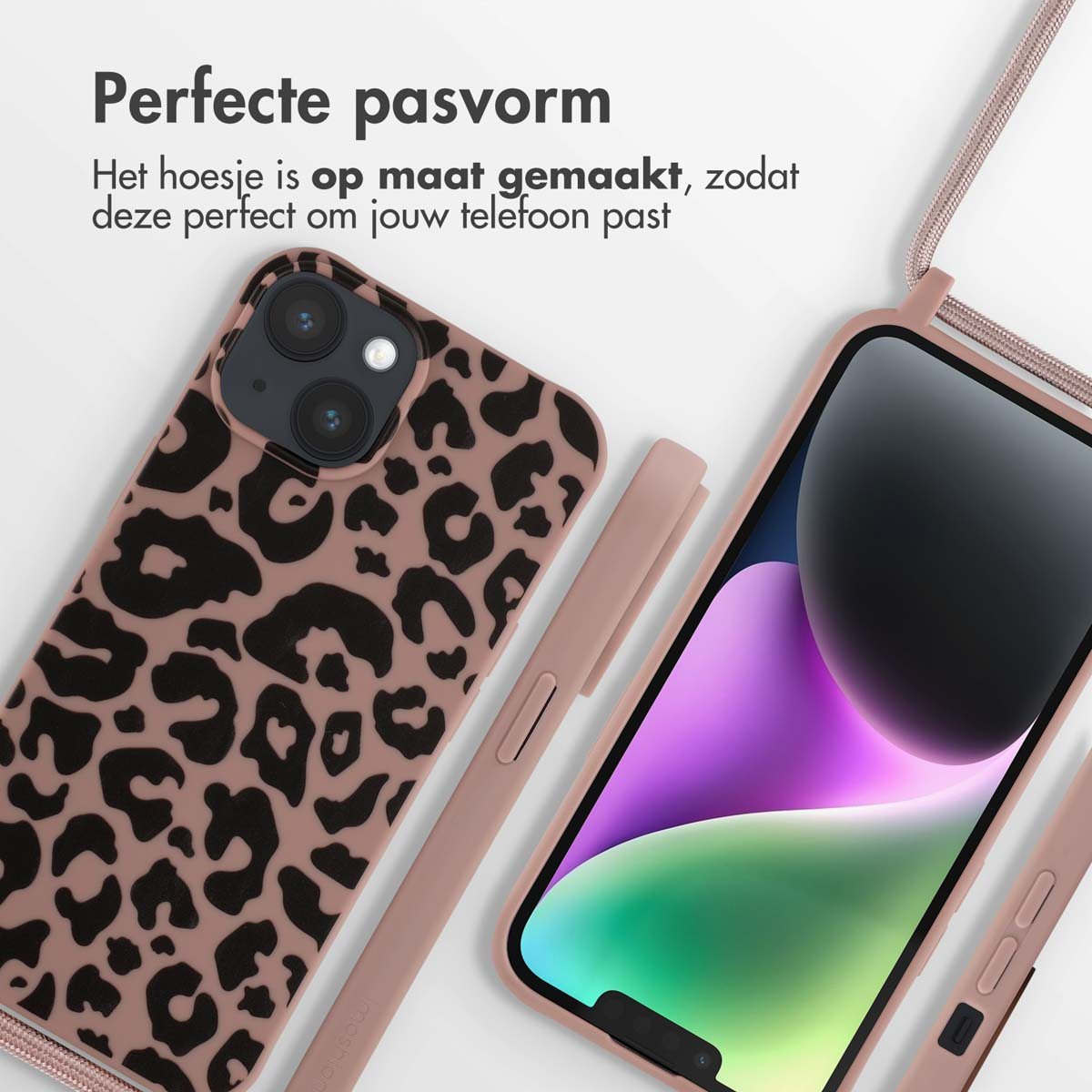 Handyhülle mit Leopardenmuster. Ein Telefon mit rosa Hülle und einem Schlüsselband ist ebenfalls sichtbar.