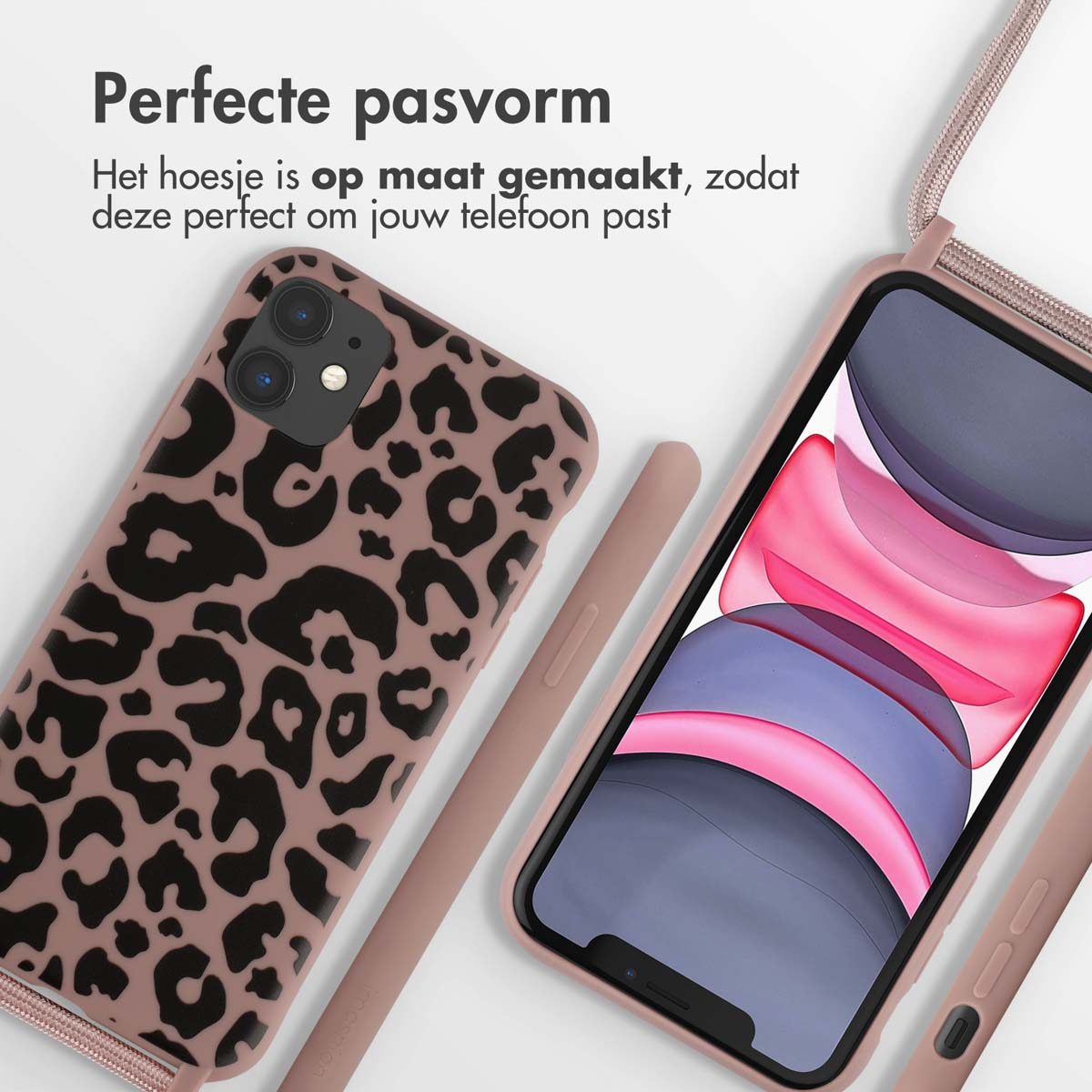 Eine rosa Handyhülle mit Leopardenflecken, neben einem Telefon mit rosa Hülle und Riemen.