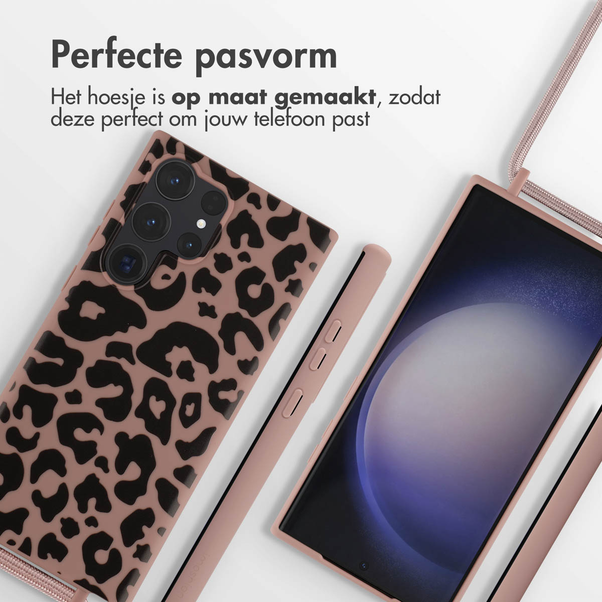 Telefoonhoesje met luipaardprint. Een telefoon met een roze hoesje en een lanyard is ook zichtbaar.