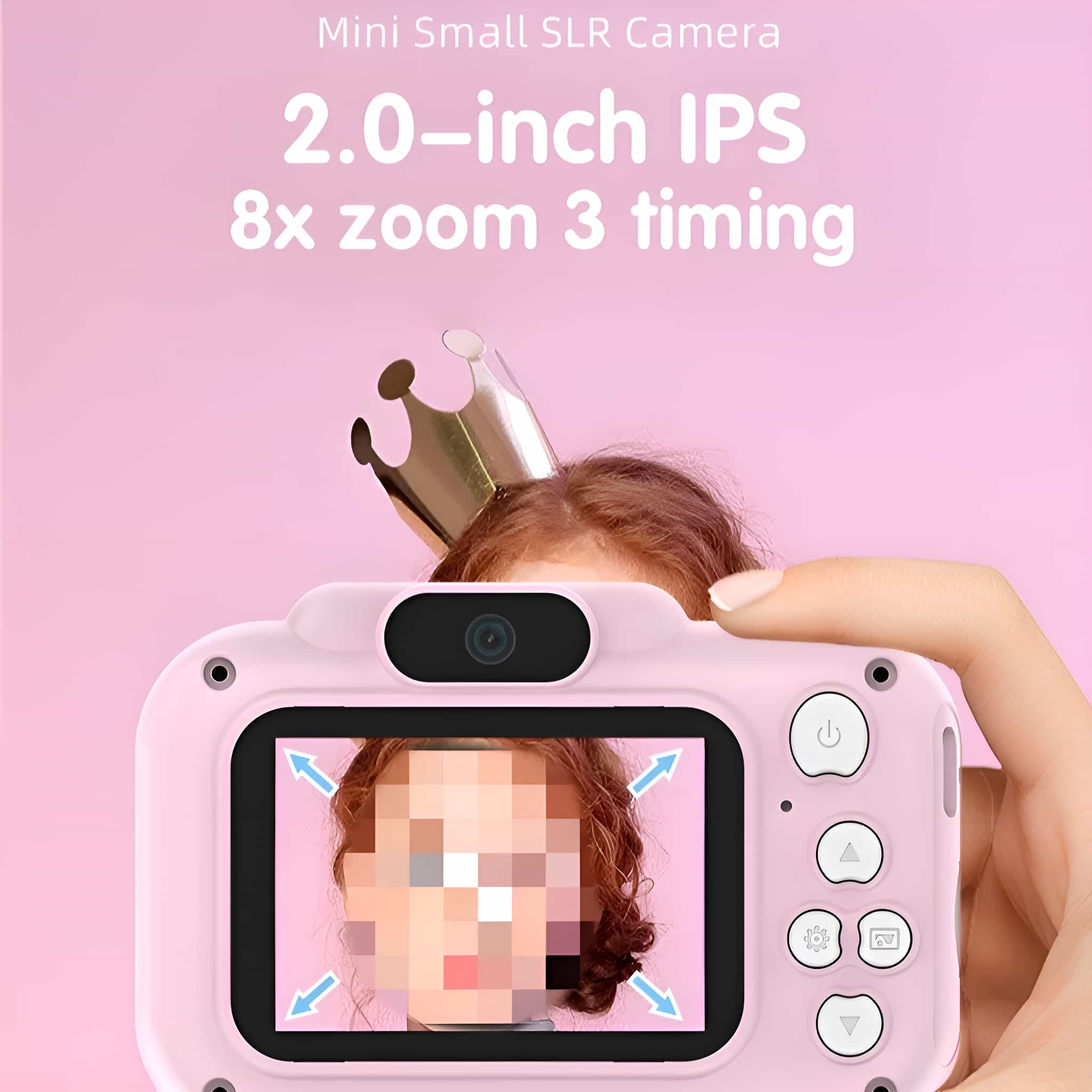 Eine rosa Spielzeugkamera mit dem Gesicht eines Kindes auf dem Bildschirm und einer Krone.