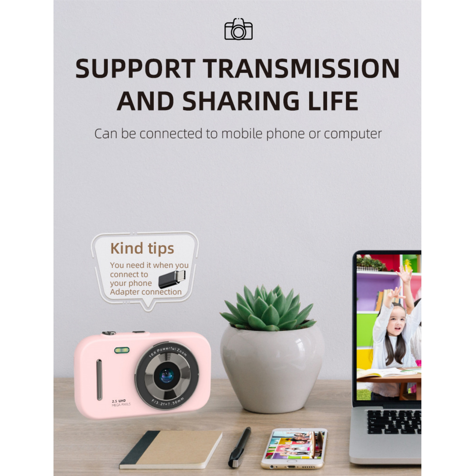 Eine pinke Digitalkamera, eine Sukkulente, ein Laptop und ein Smartphone. Der Text sagt, teile das Leben.