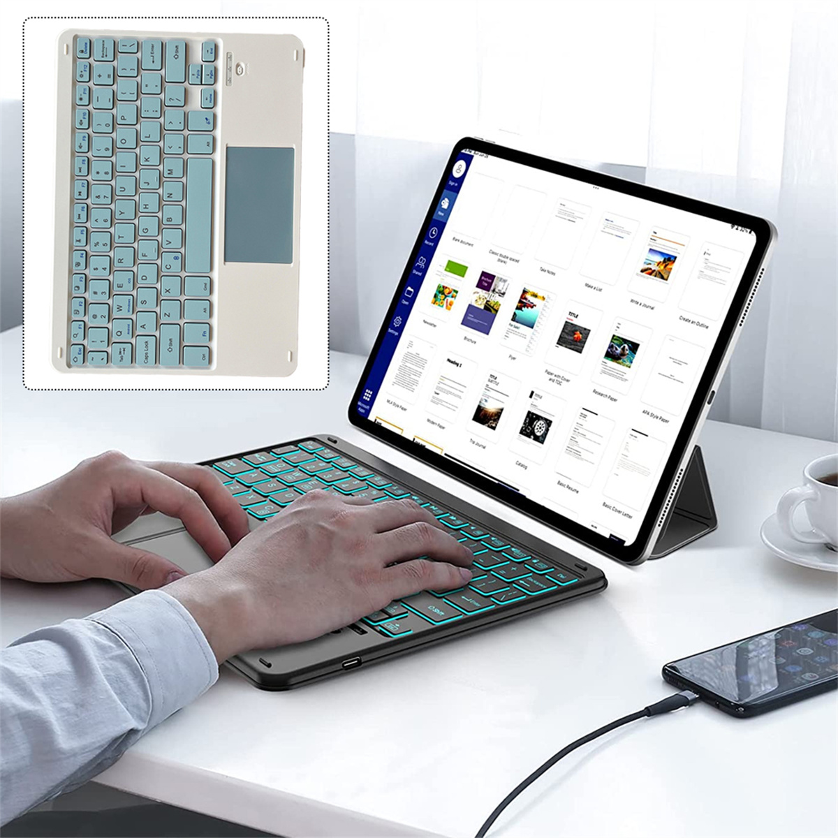 Ein Tablet mit Tastatur. Die Tastatur hat blaue Tasten und ein Touchpad. Das Tablet zeigt ein Dokument.