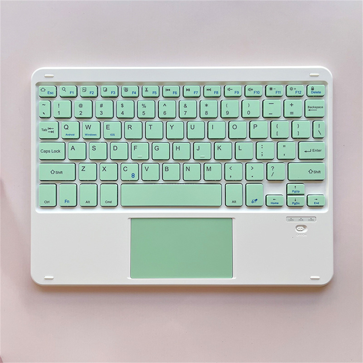 Weiße Tastatur mit mintgrünen Tasten und Touchpad.