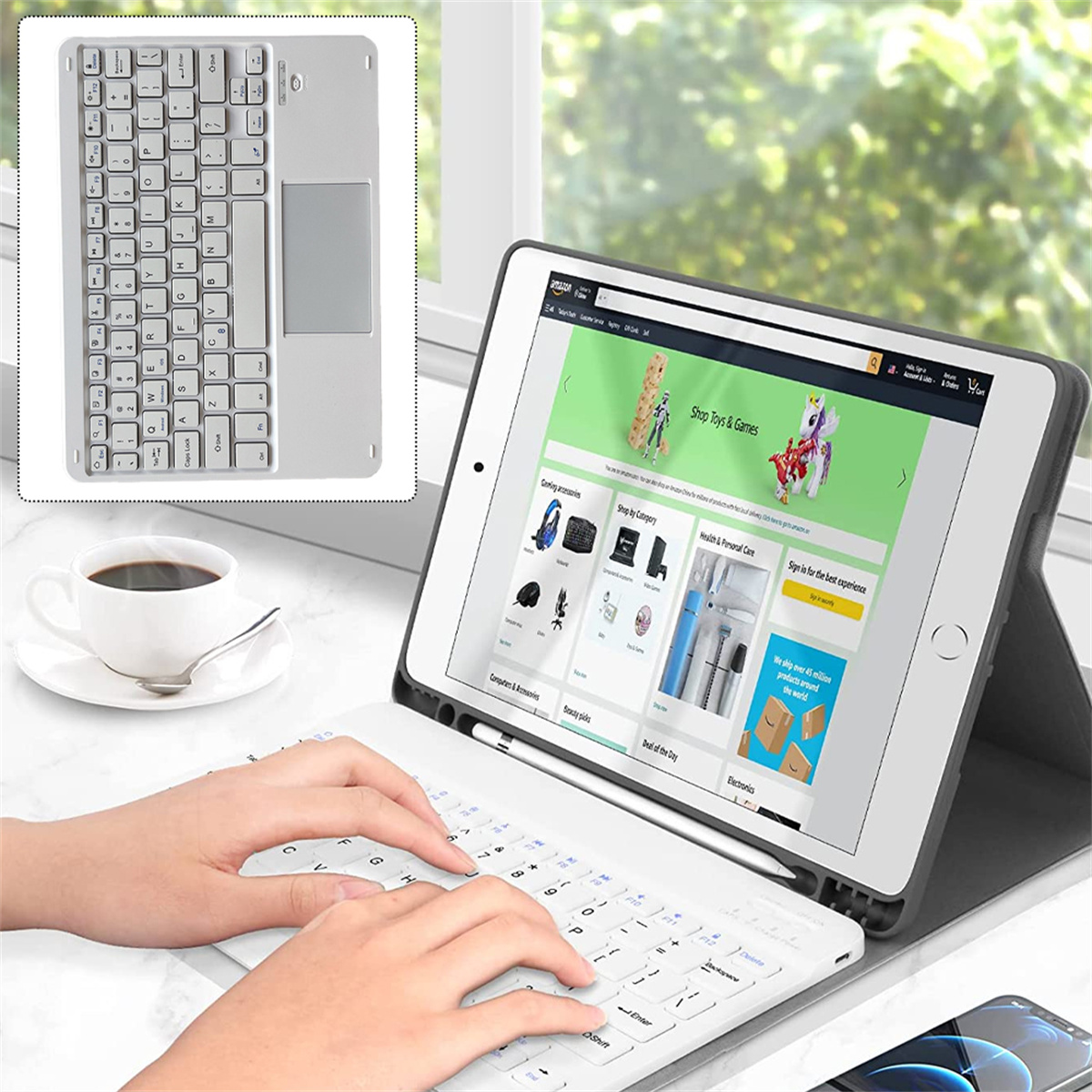 Tablet mit Tastatur und Stift-Setup. Das Tablet zeigt eine Webseite an.