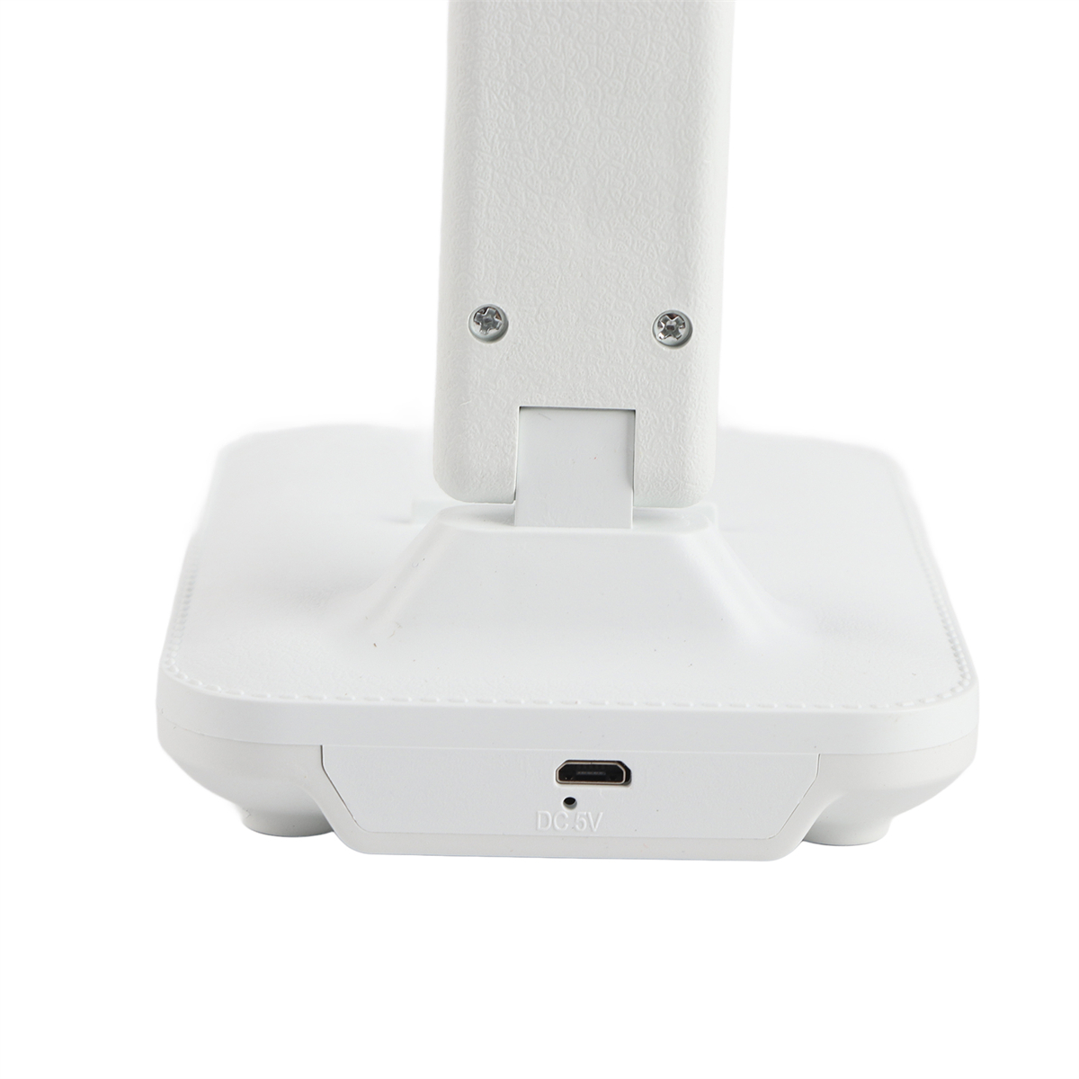 Ein weißer Schreibtischlampensockel mit USB-Anschluss. Die Lampe ist zusammengeklappt, und der Sockel ist weiß.