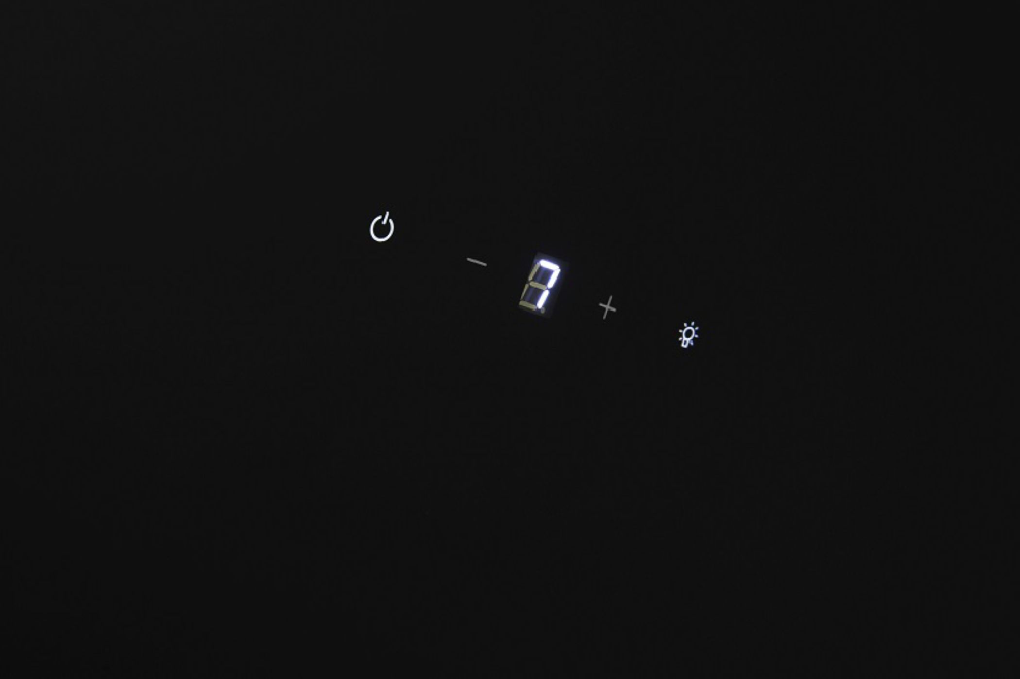 Black screen with white icons for power, minus, eight, plus, and light.