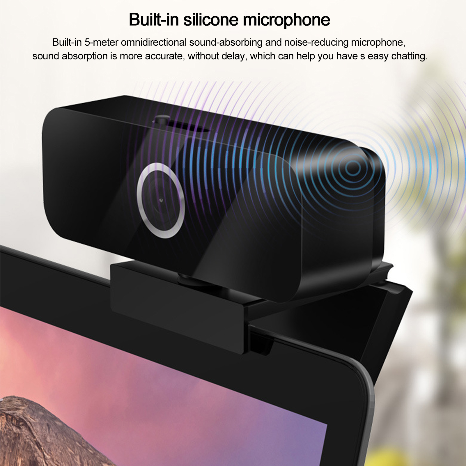 Eine Webcam, die an einem Laptop montiert ist, mit dem Text „Built-in silicone microphone“ (Eingebautes Silikonmikrofon).