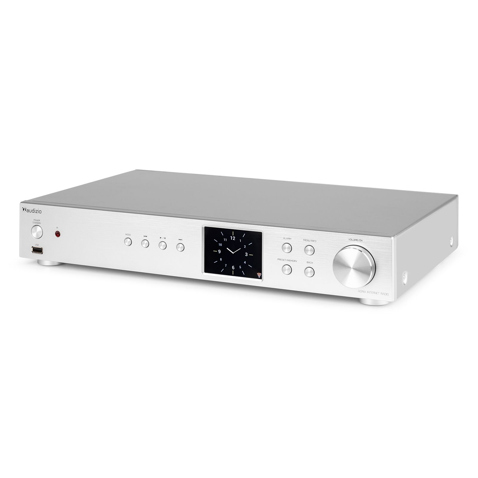 Receptor de audio plateado con pantalla de reloj y botones. Tiene una perilla de volumen en el lado derecho.