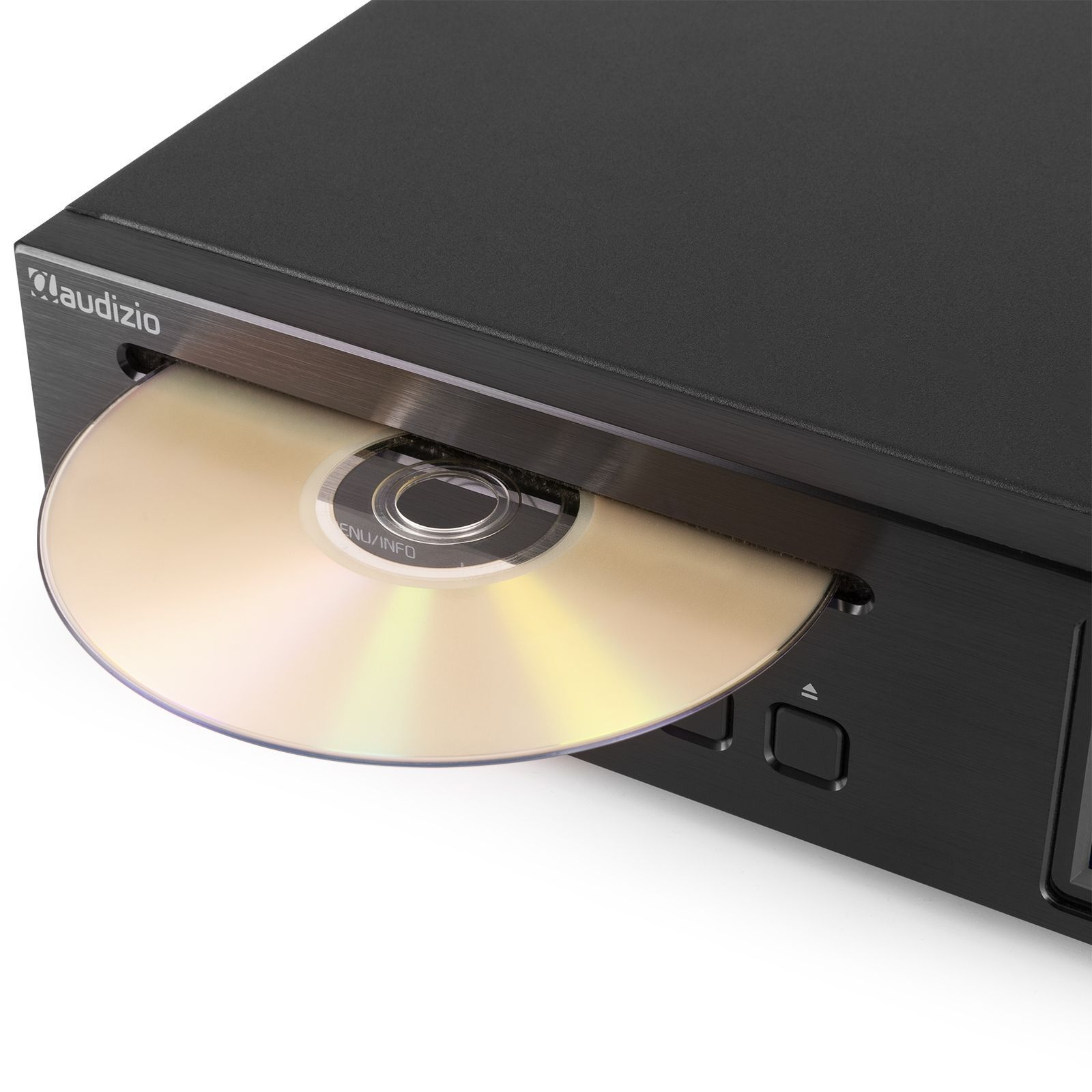 Reproductor de CD negro con un CD dorado parcialmente expulsado. La bandeja está abierta, mostrando el disco.