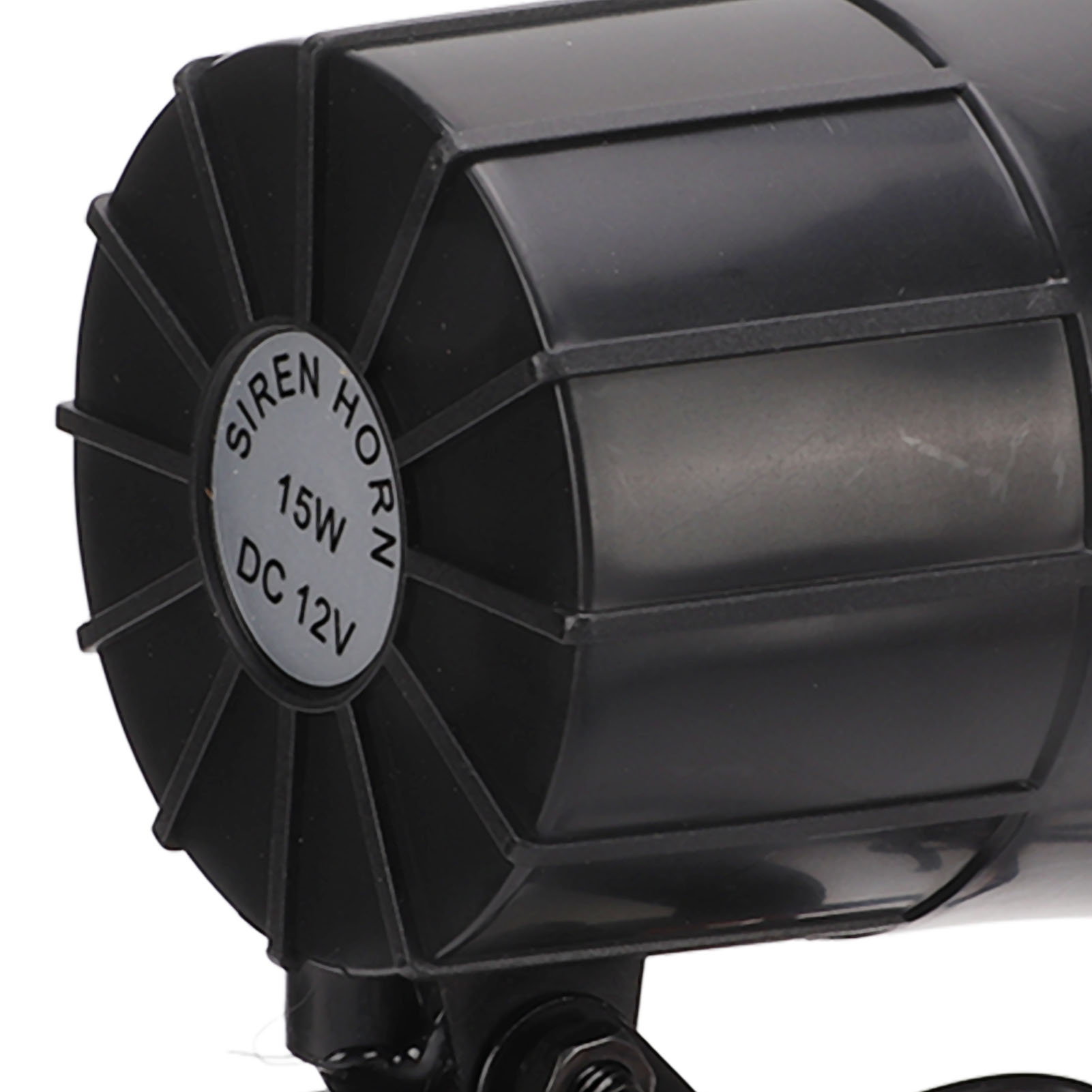 Eine schwarze Sirenenhupe mit der Aufschrift: SIREN HORN, 15W, DC 12V. Die Hupe ist ein schwarzes Achteck.