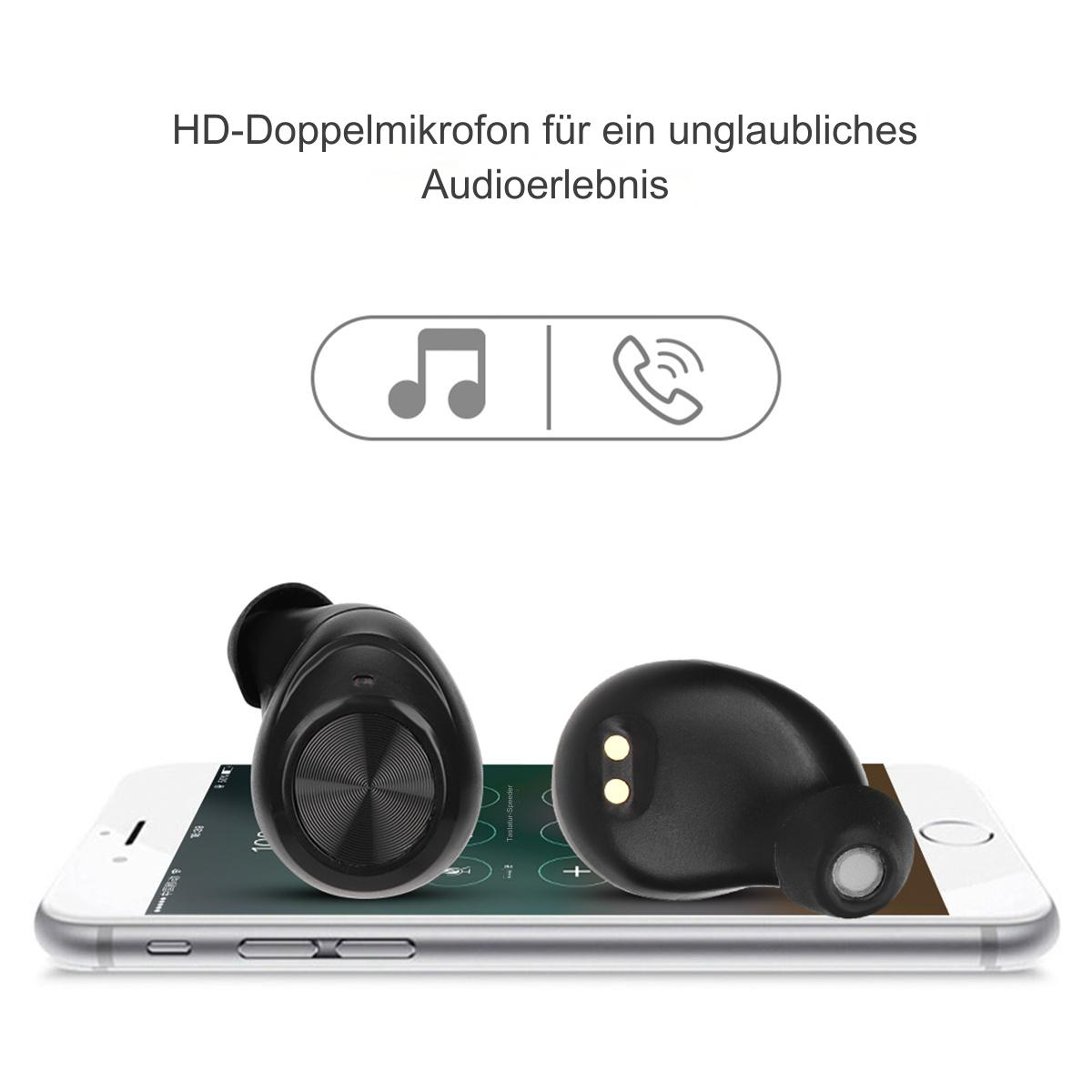 Zwei schwarze Ohrhörer auf einem Telefon.