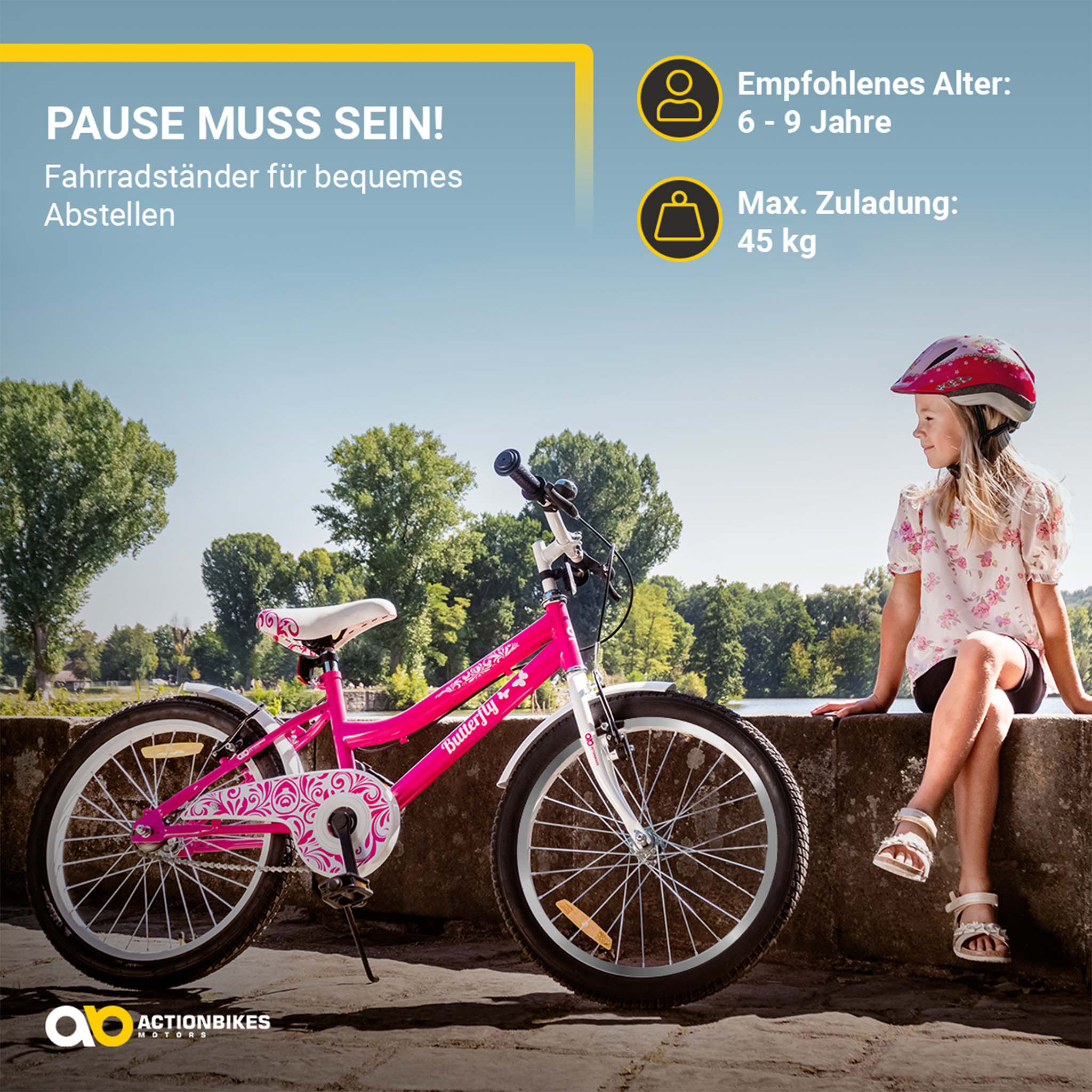Pinkes Fahrrad mit weißen Akzenten, ein Mädchen sitzt auf einer Mauer im Park. Hintergrund ist Himmel.