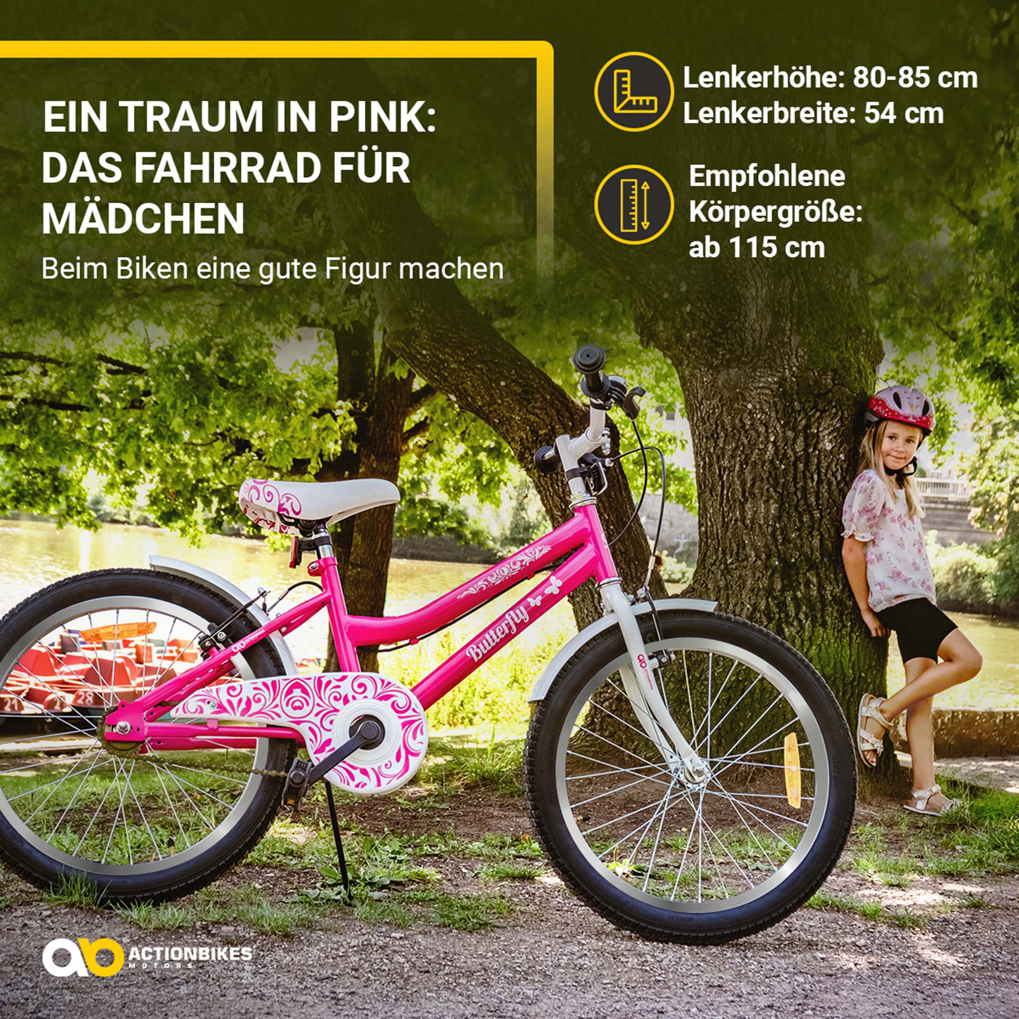Ein rosa Mädchenfahrrad mit einem jungen Mädchen daneben. Im Hintergrund ist ein Baum.