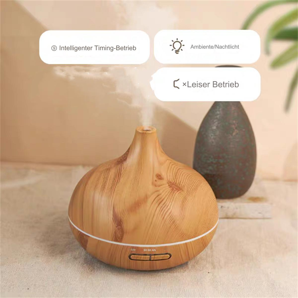 Ein Holz-Duftdiffusor mit dunkler Vase im Hintergrund.
