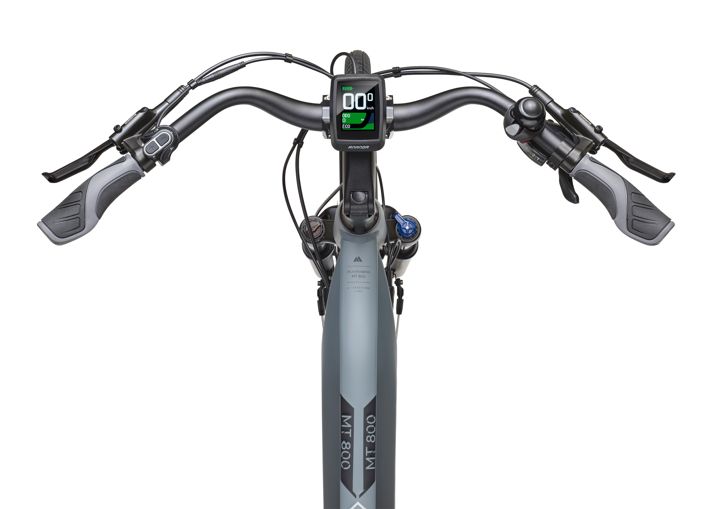 Draufsicht auf einen grauen E-Bike-Lenker. Ein Display zeigt die Geschwindigkeit. Graue Griffe und Hebel sind sichtbar.