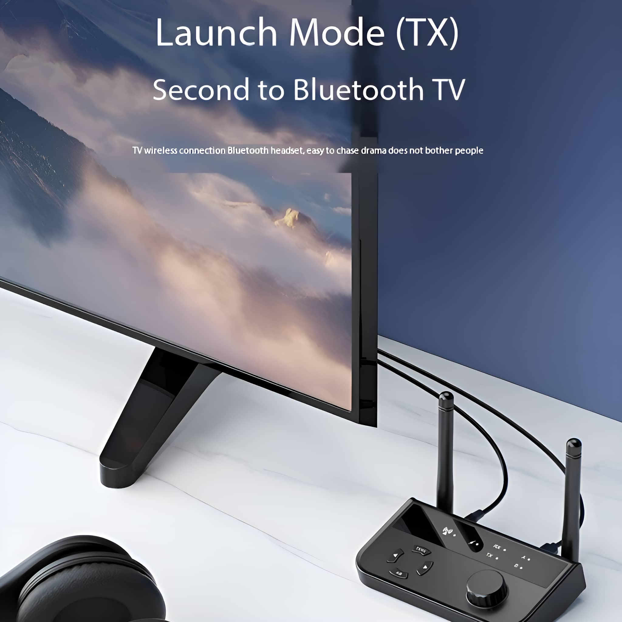 Schwarzes Gerät, das mit einem Fernseher verbunden ist, mit Antennen. Zeigt den Startmodus-Text an.