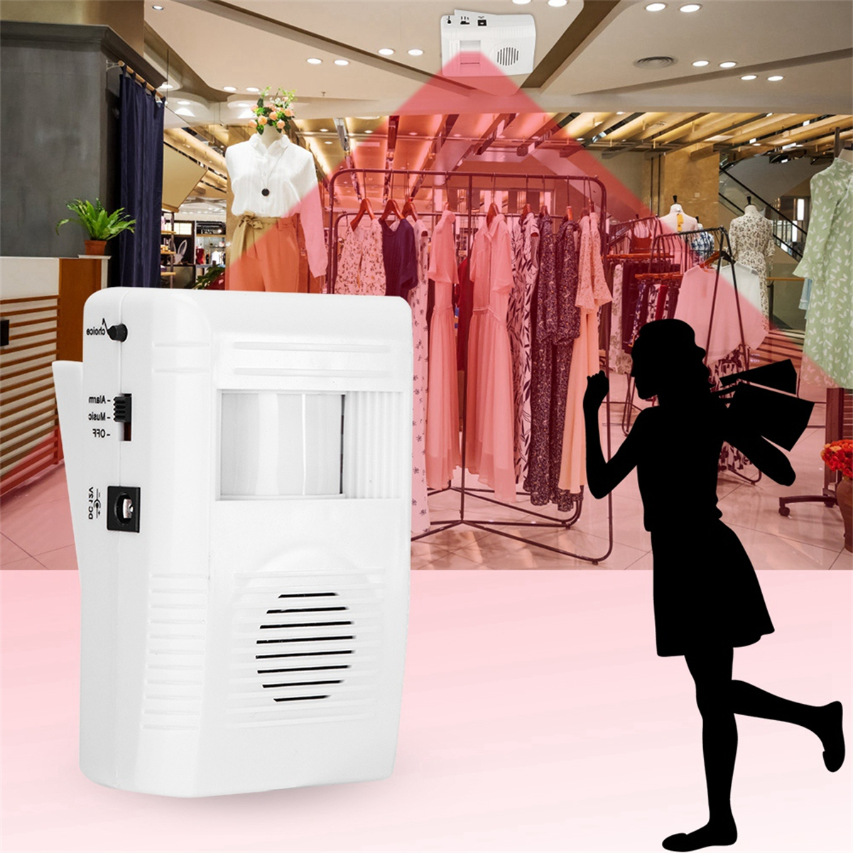 Ein Sicherheitsgerät mit Infrarotsensor in einem Bekleidungsgeschäft. Eine Person als Silhouette sichtbar.