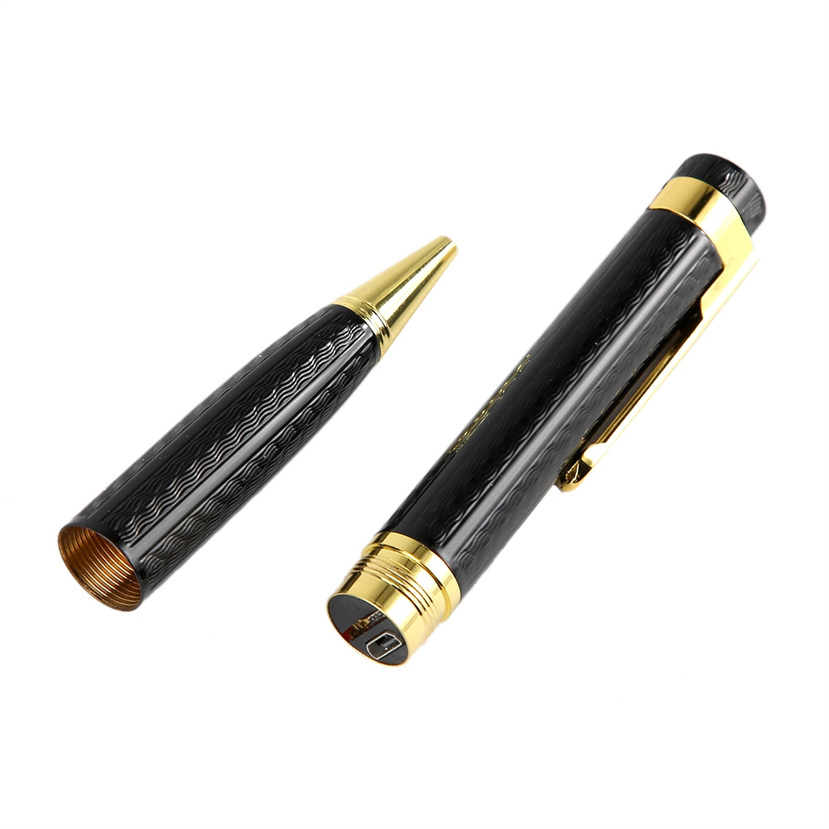Schwarzer Stift, zerlegt mit goldener Spitze. Der Stift liegt auf einer weißen Oberfläche.