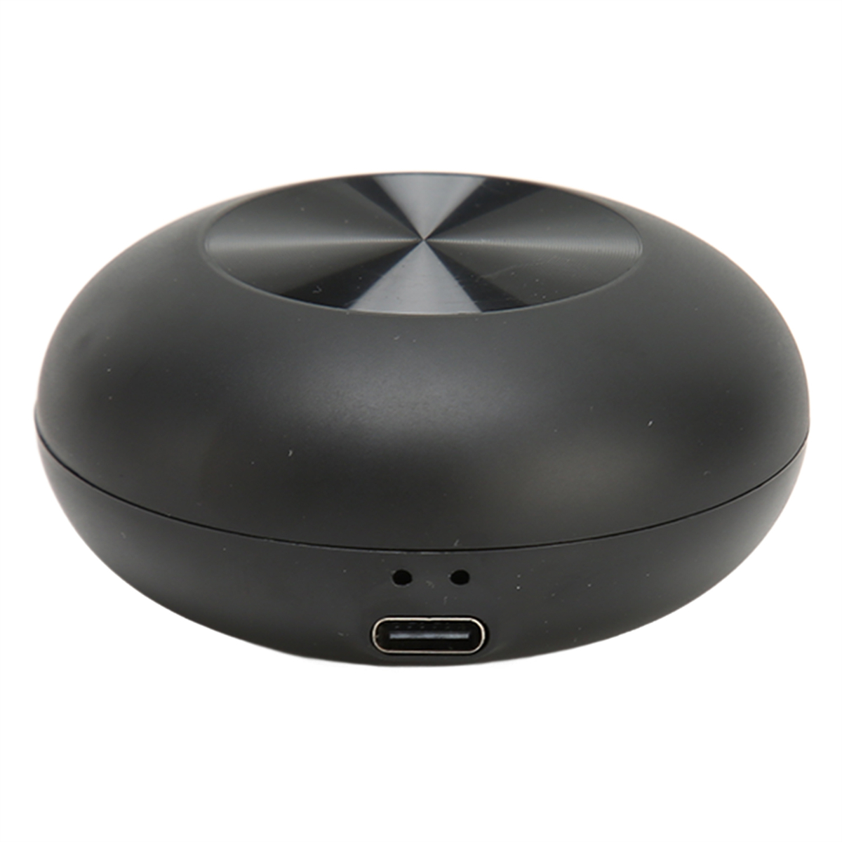 Ein schwarzes, rundes Gerät mit USB-C-Anschluss. Es hat eine metallische Oberseite.