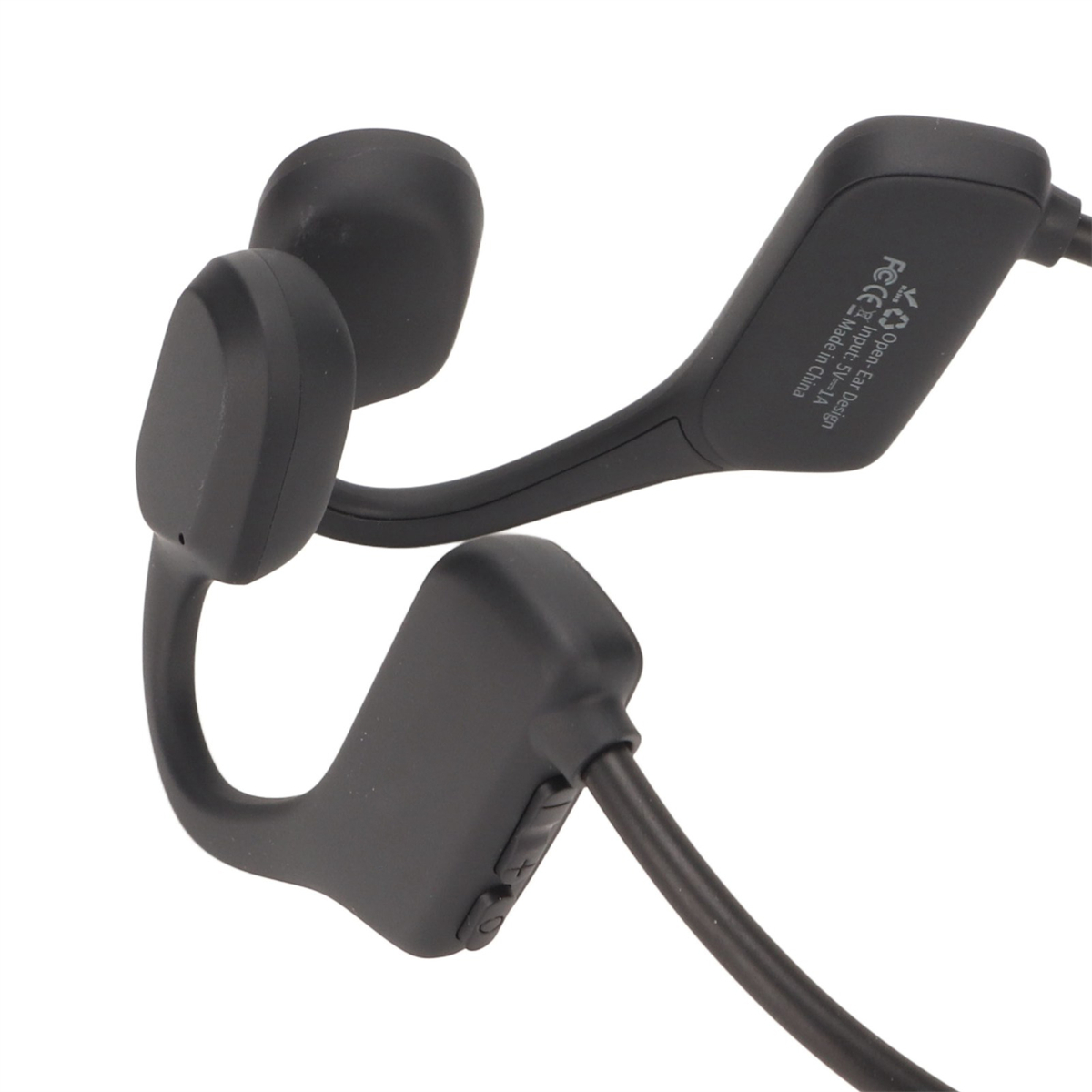 Schwarze Knochenschallkopfhörer mit Kabel. Die Kopfhörer biegen sich um das Ohr.