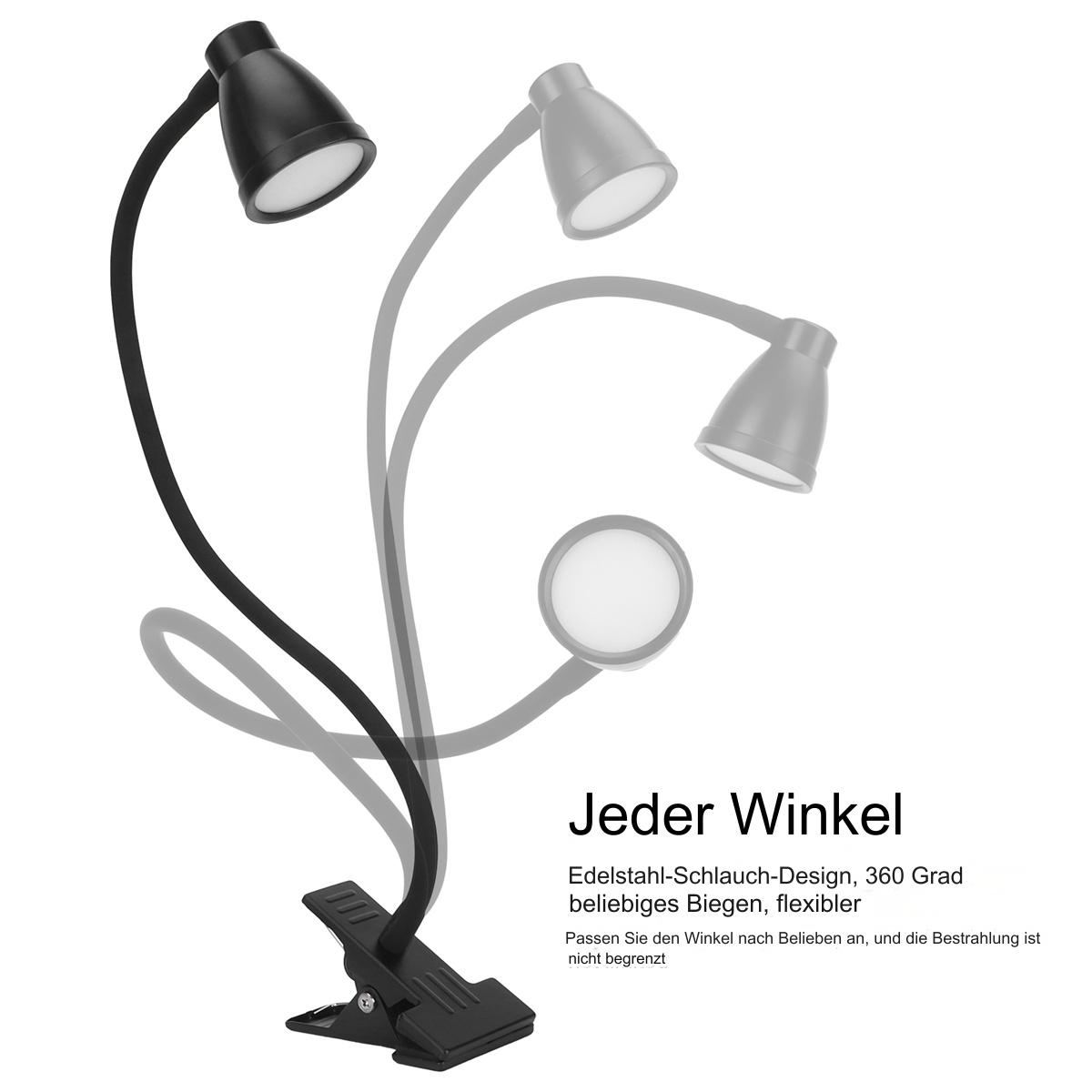 Schwarze Schreibtischlampe mit flexiblem Arm. Zusätzliche Lampen unscharf.