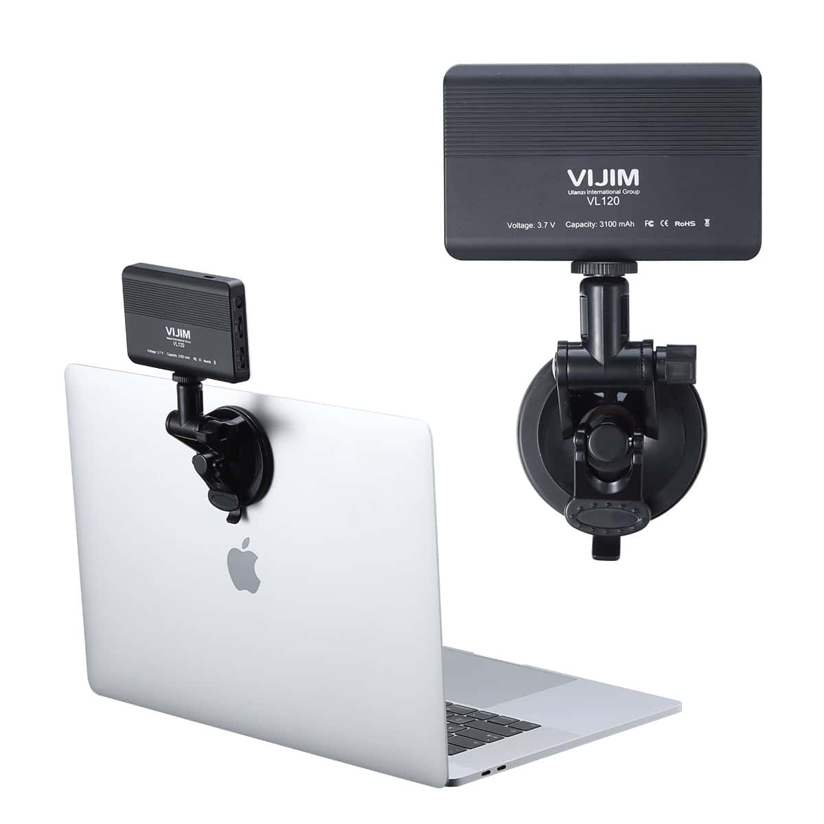 Ordinateur portable avec deux lumières attachées, une sur l'écran, une à côté.