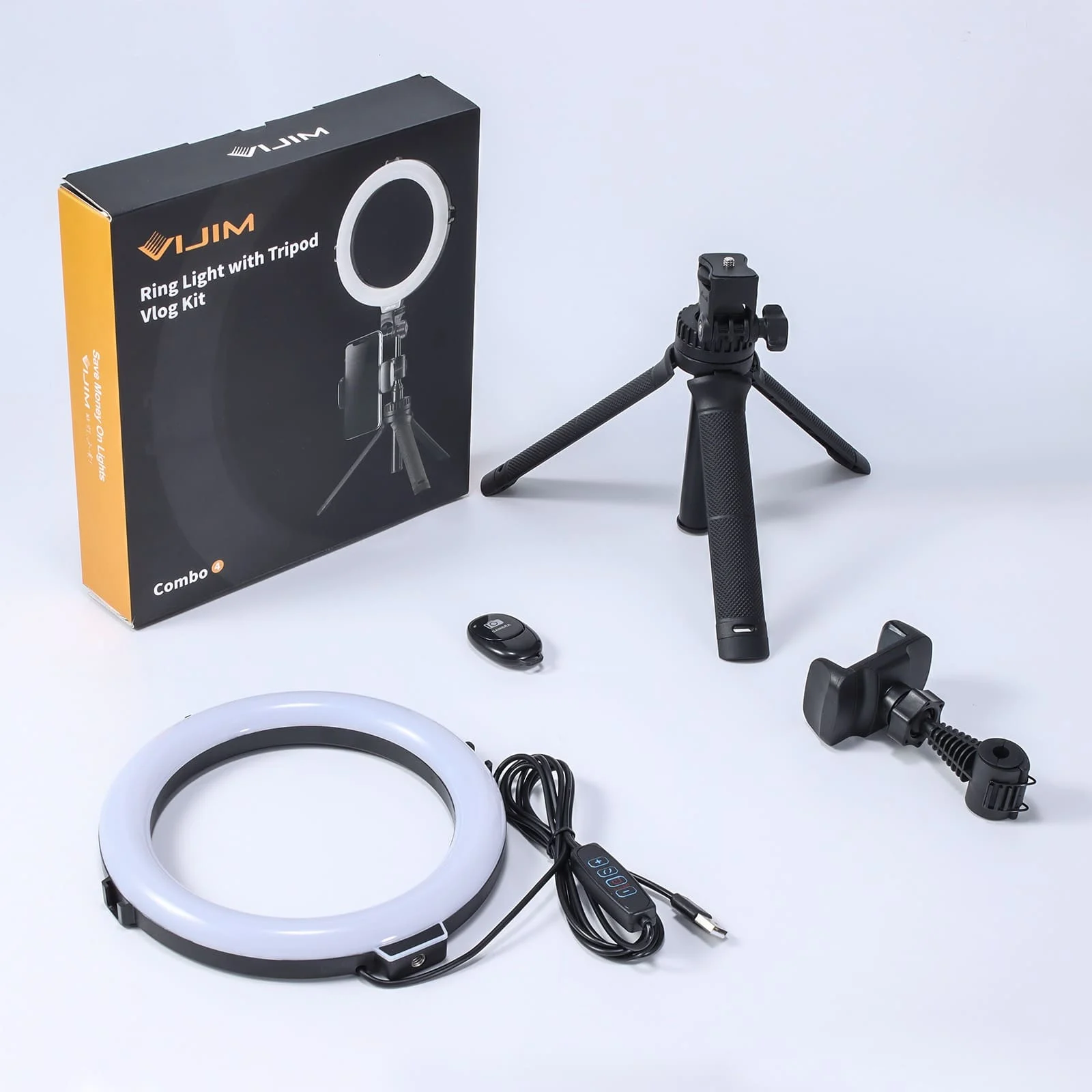 Ring light kit with tripod, phone holder, and remote, on a white surface.