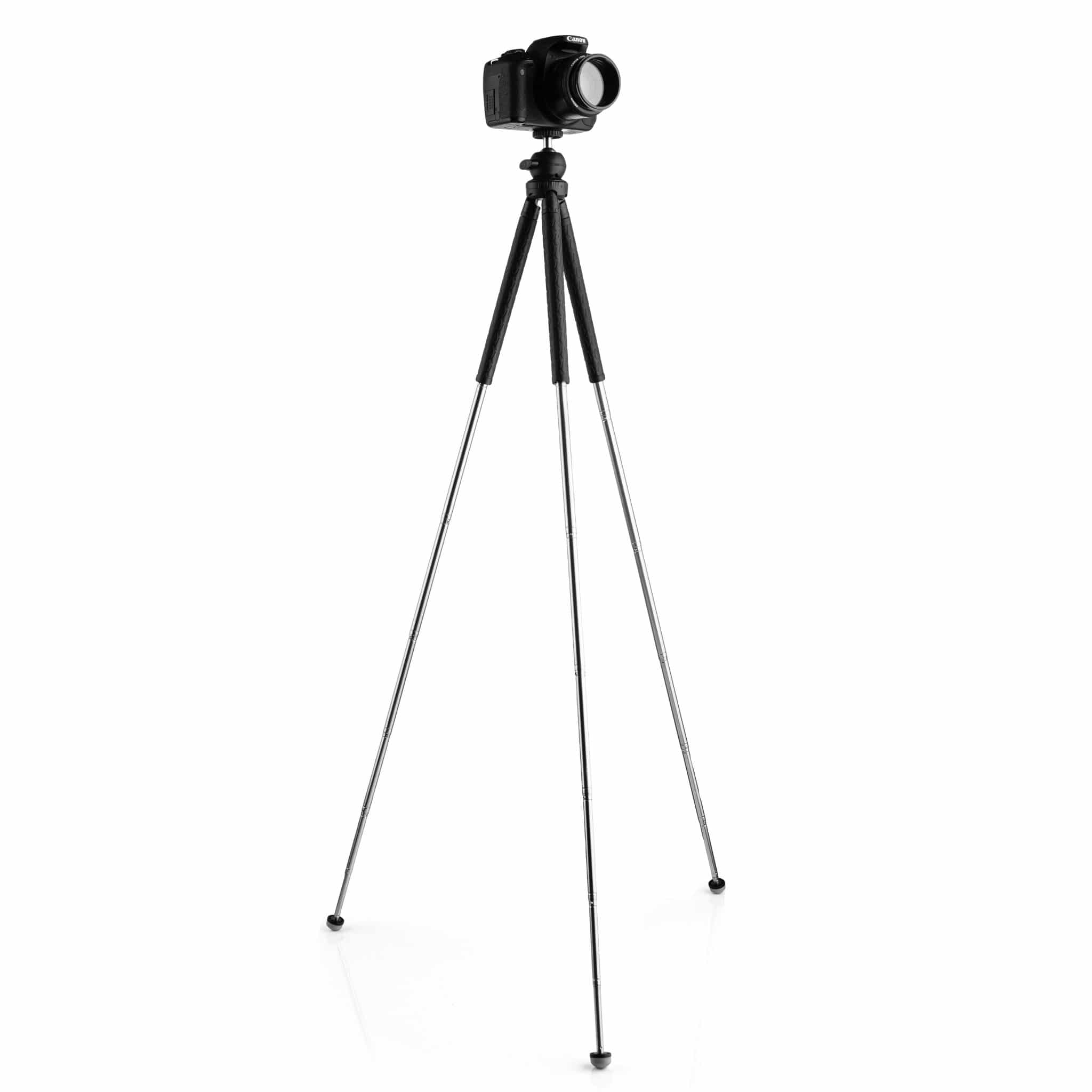Black camera on a tripod. The tripod has three legs and is on a white background.