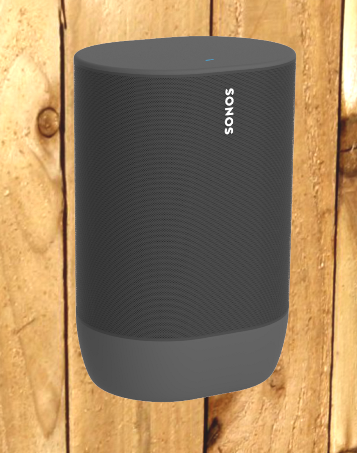 Een grijze Sonos-luidspreker. De luidspreker is cilindrisch en staat tegen een houten achtergrond.