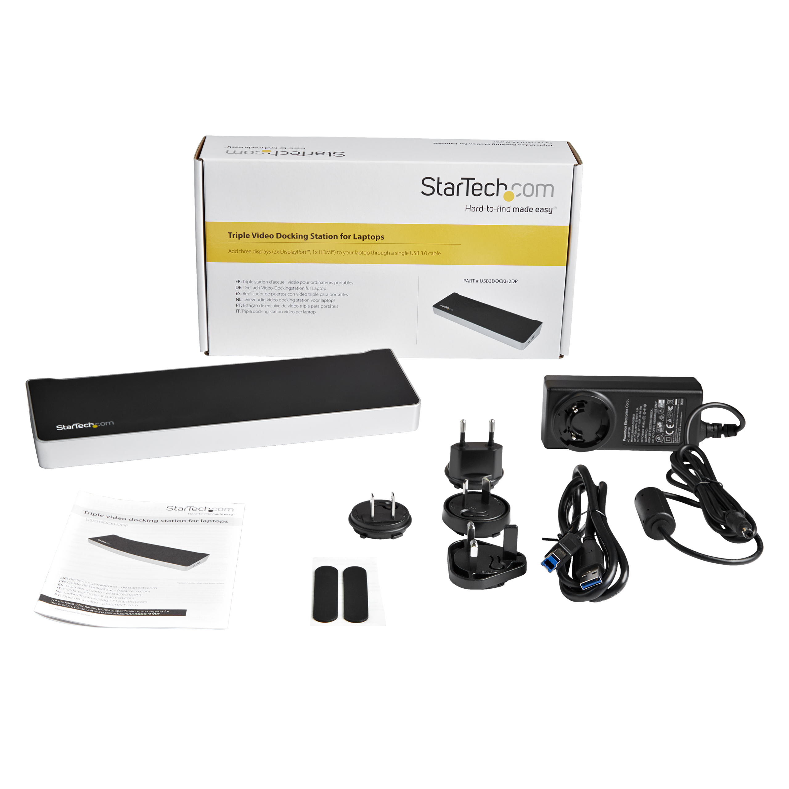 Scatola bianca con una docking station video tripla per laptop e accessori, cavi e adattatori di alimentazione.