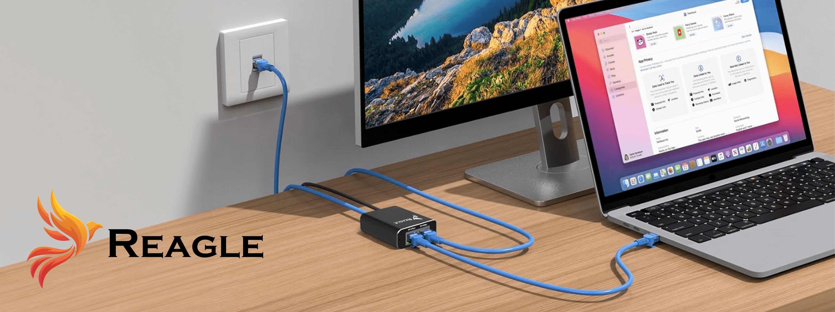 Konfiguracja biurka z laptopem, monitorem i urządzeniem Reagle połączonym niebieskimi kablami.