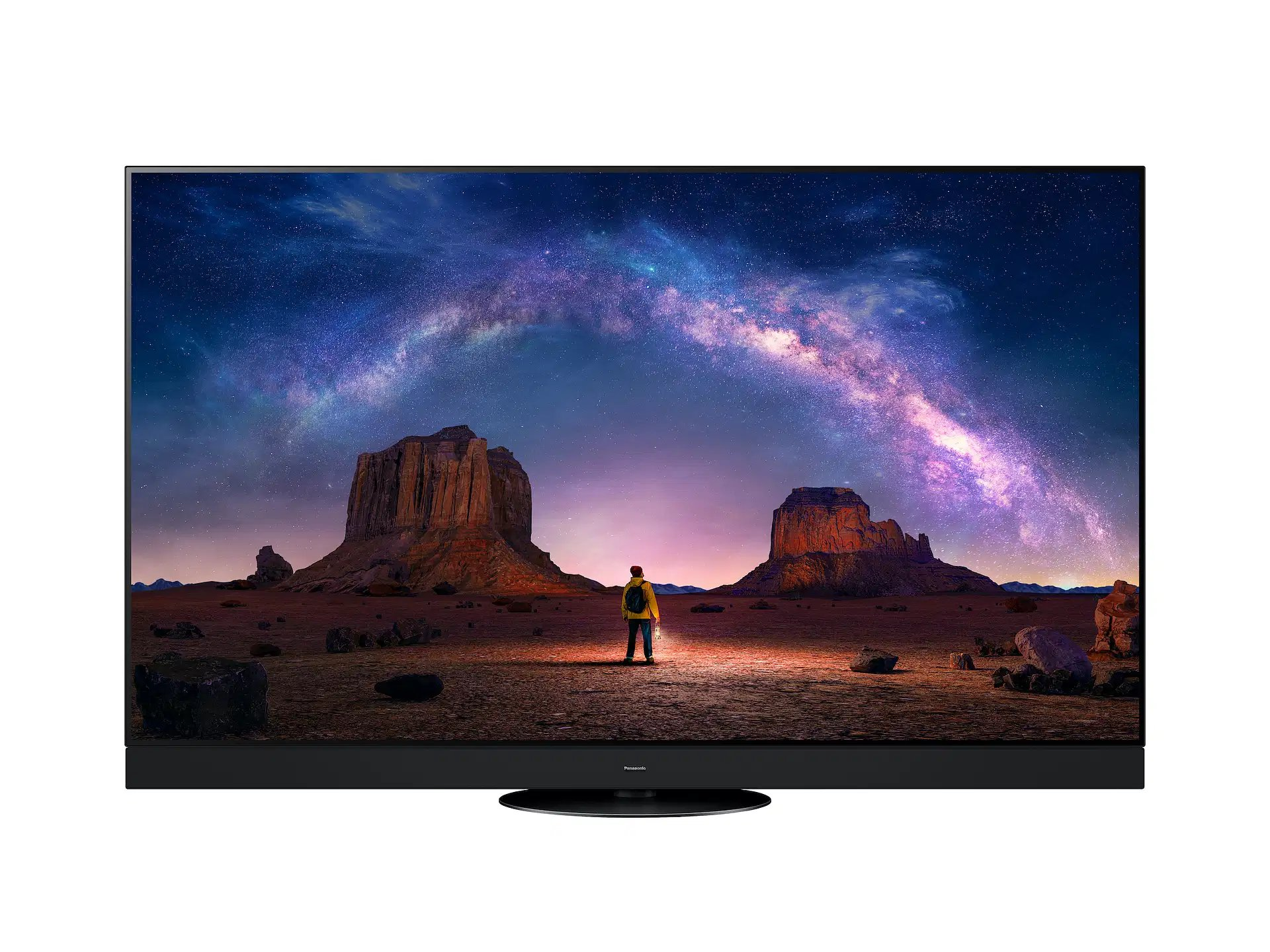 Una TV che mostra un paesaggio notturno con una persona e la Via Lattea.