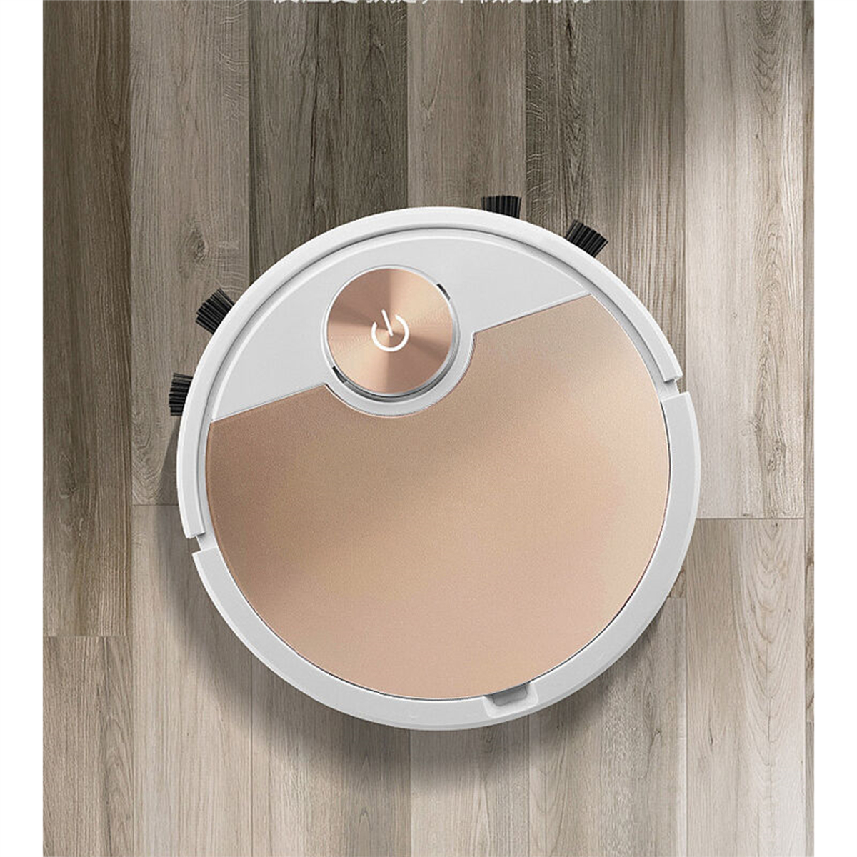 Draufsicht eines Roboter-Staubsaugers auf Holzboden. Er ist gold und weiß.