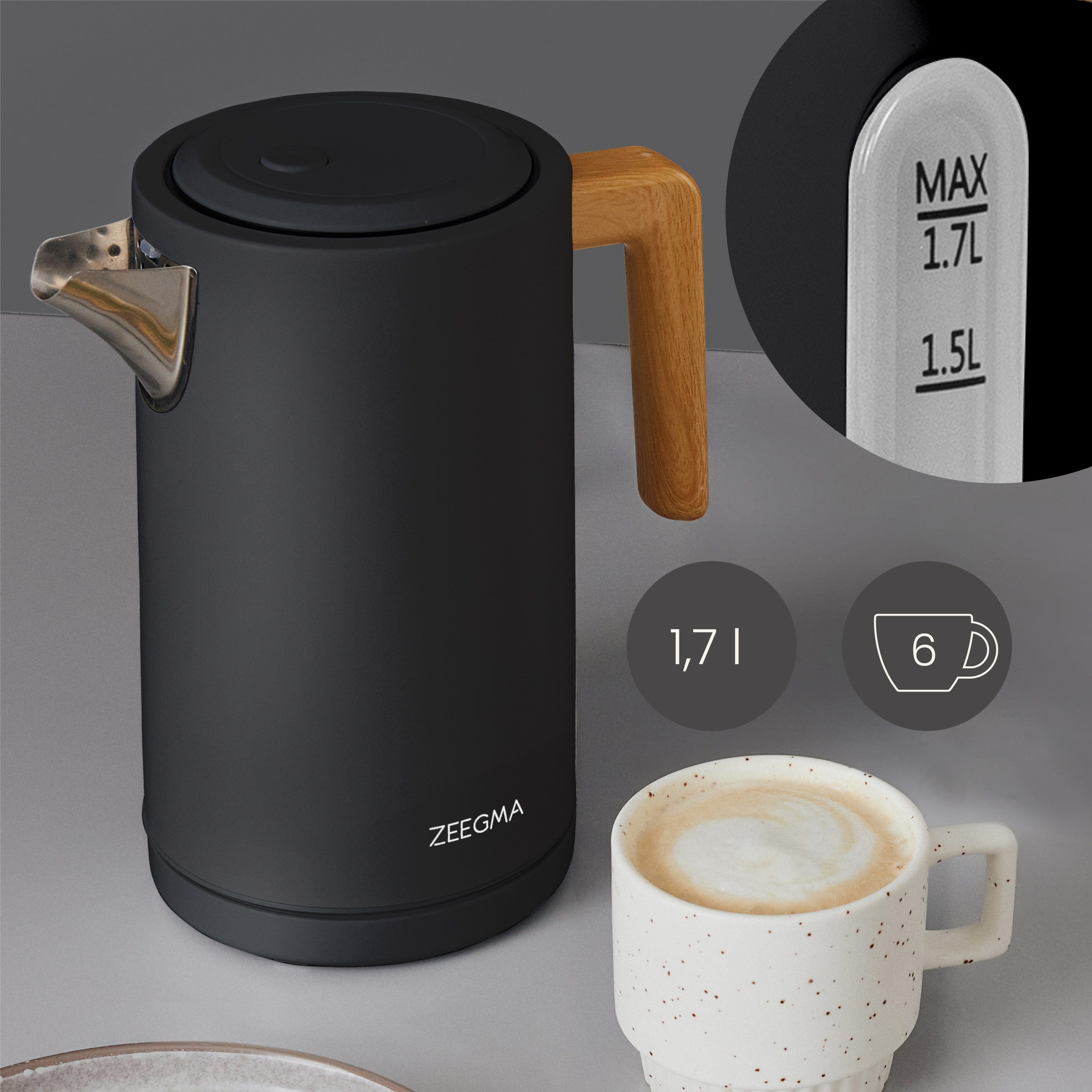 Czarny czajnik elektryczny z drewnianym uchwytem i filiżanka latte art na białej powierzchni.