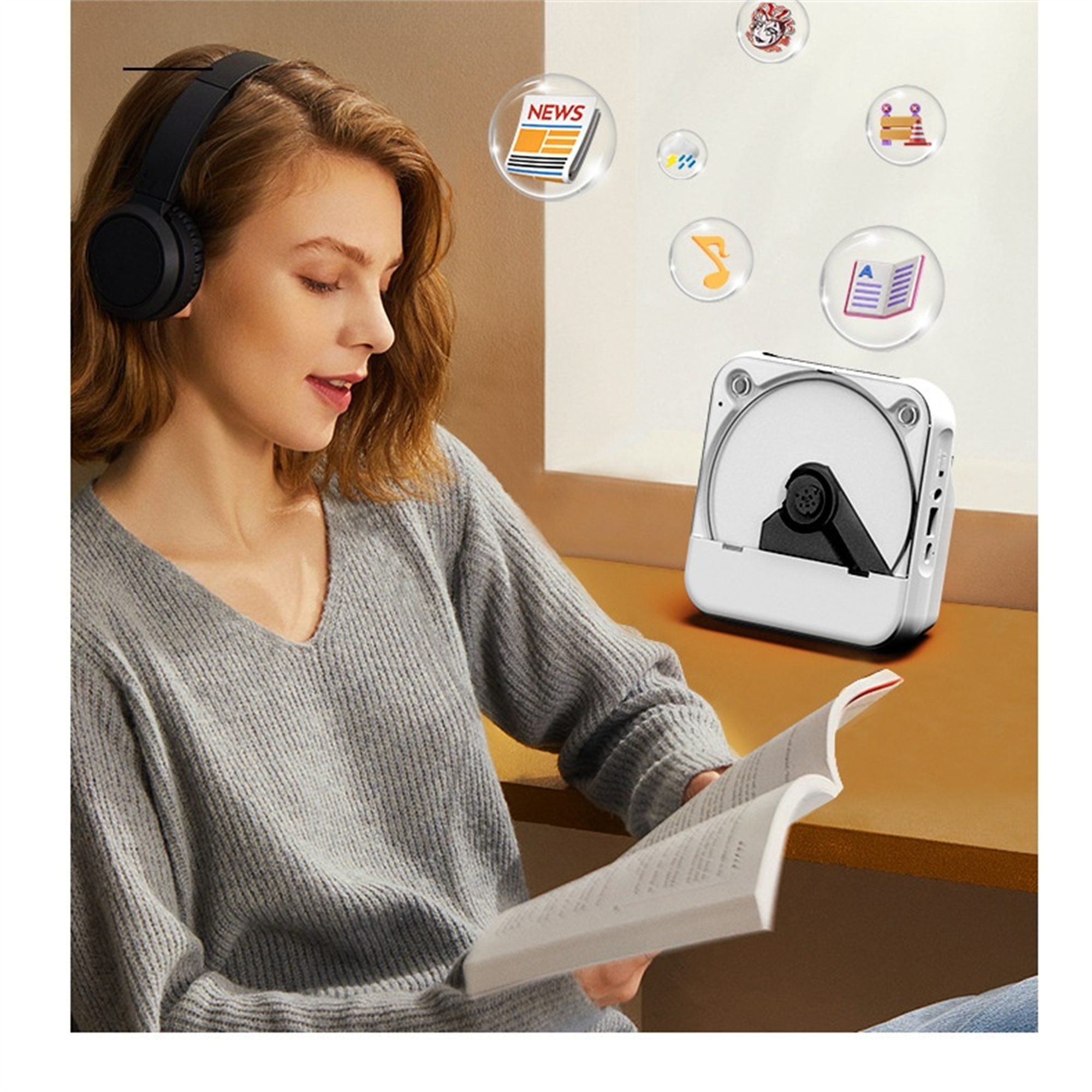 Frau liest Buch, hört Musik mit Kopfhörern und einem tragbaren CD-Player.