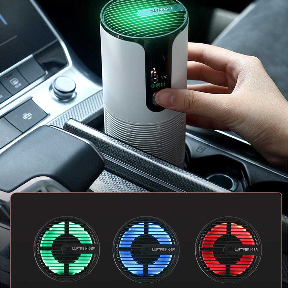 Auto-Luftreiniger mit einer Hand, die ihn berührt, und 3 farbigen Lichtern darunter.
