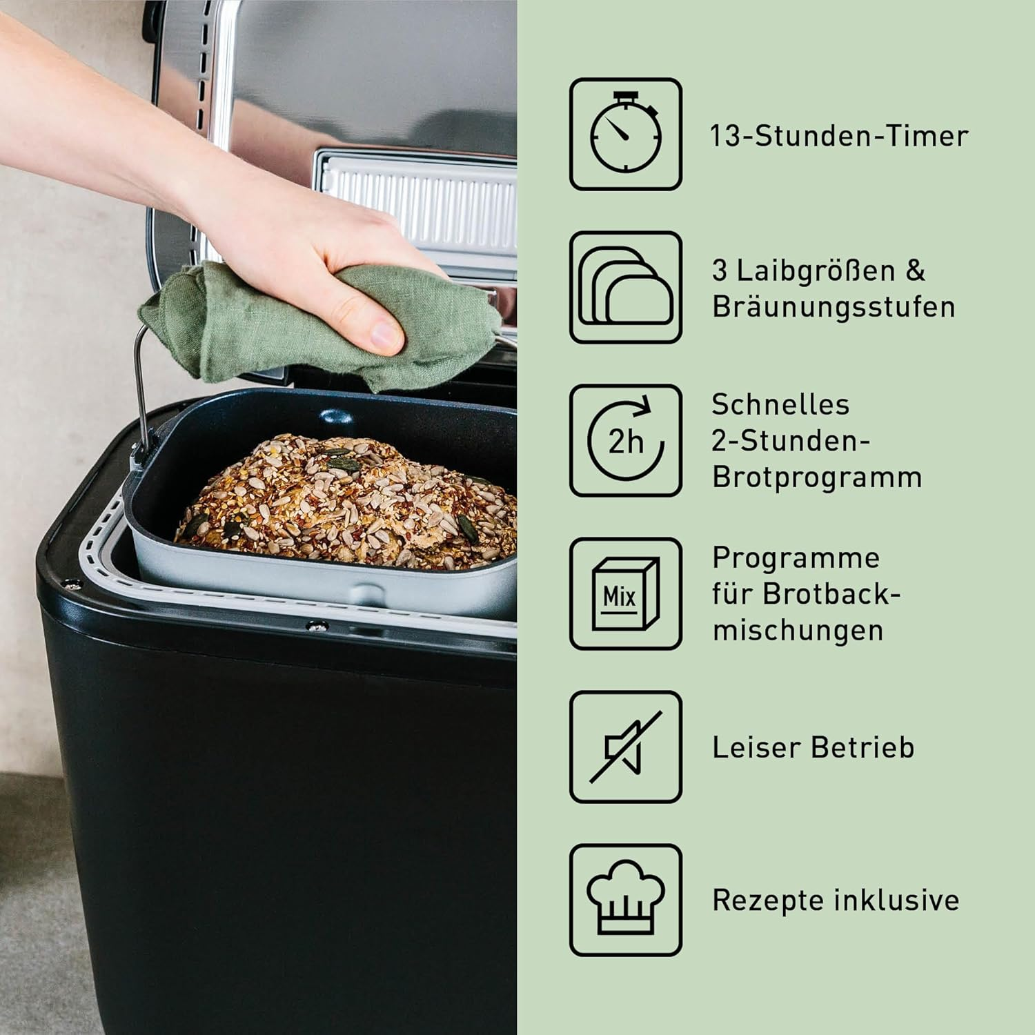 Ein Brotbackautomat mit einem Brot darin. Zeigt Funktionen: Timer, Brotgrößen, Schnellprogramm und Rezepte.