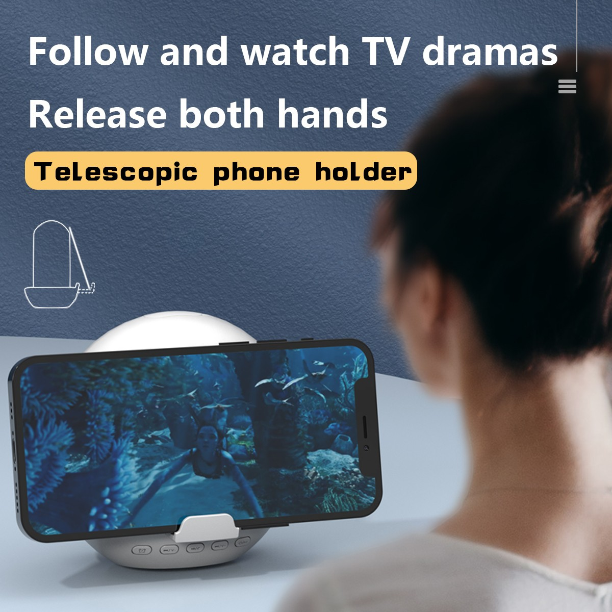 Ein Telefon auf einem Ständer, das eine Filmszene anzeigt, mit Text darüber.