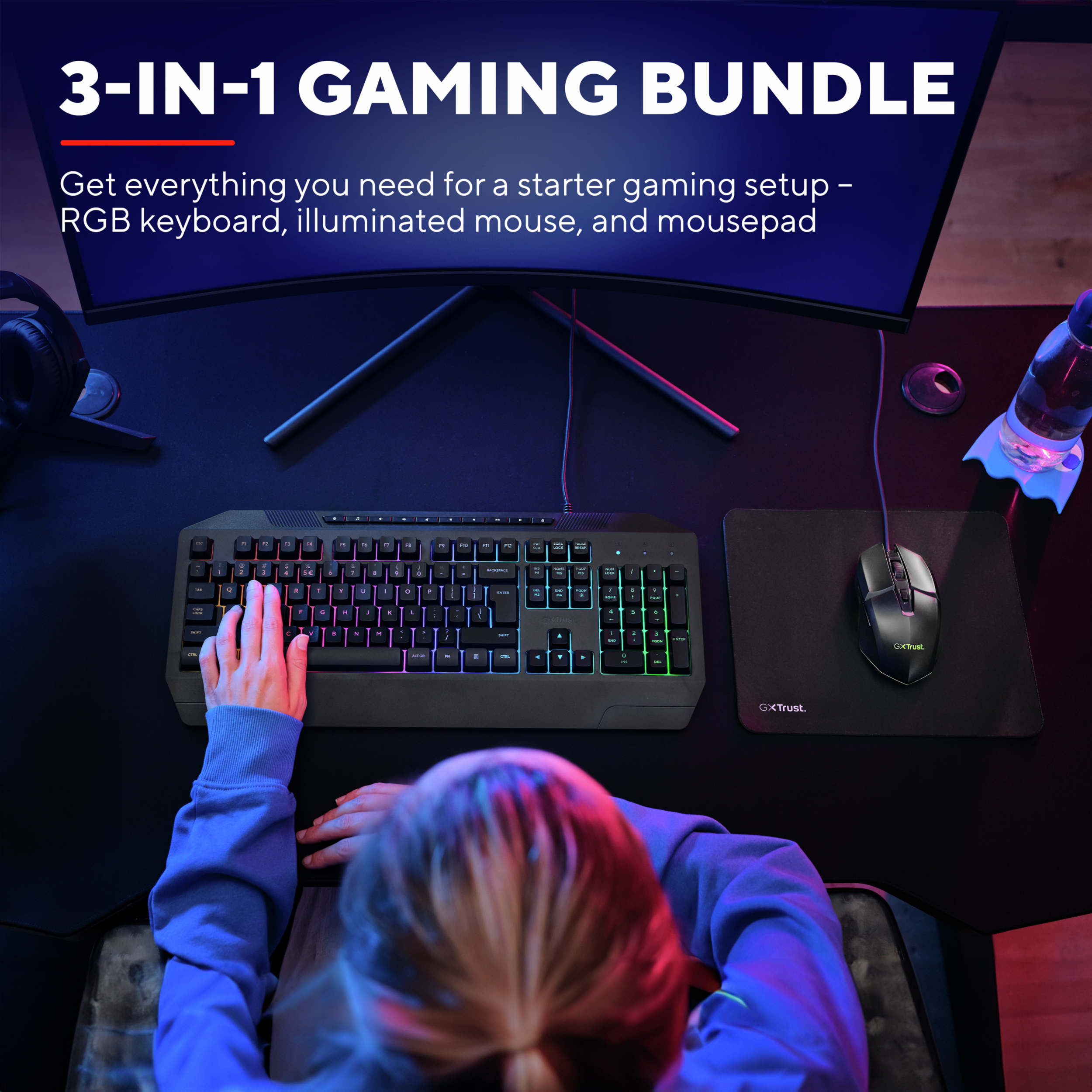 Osoba używająca klawiatury RGB, myszy i podkładki na biurku do gier. Zakrzywiony monitor w tle.