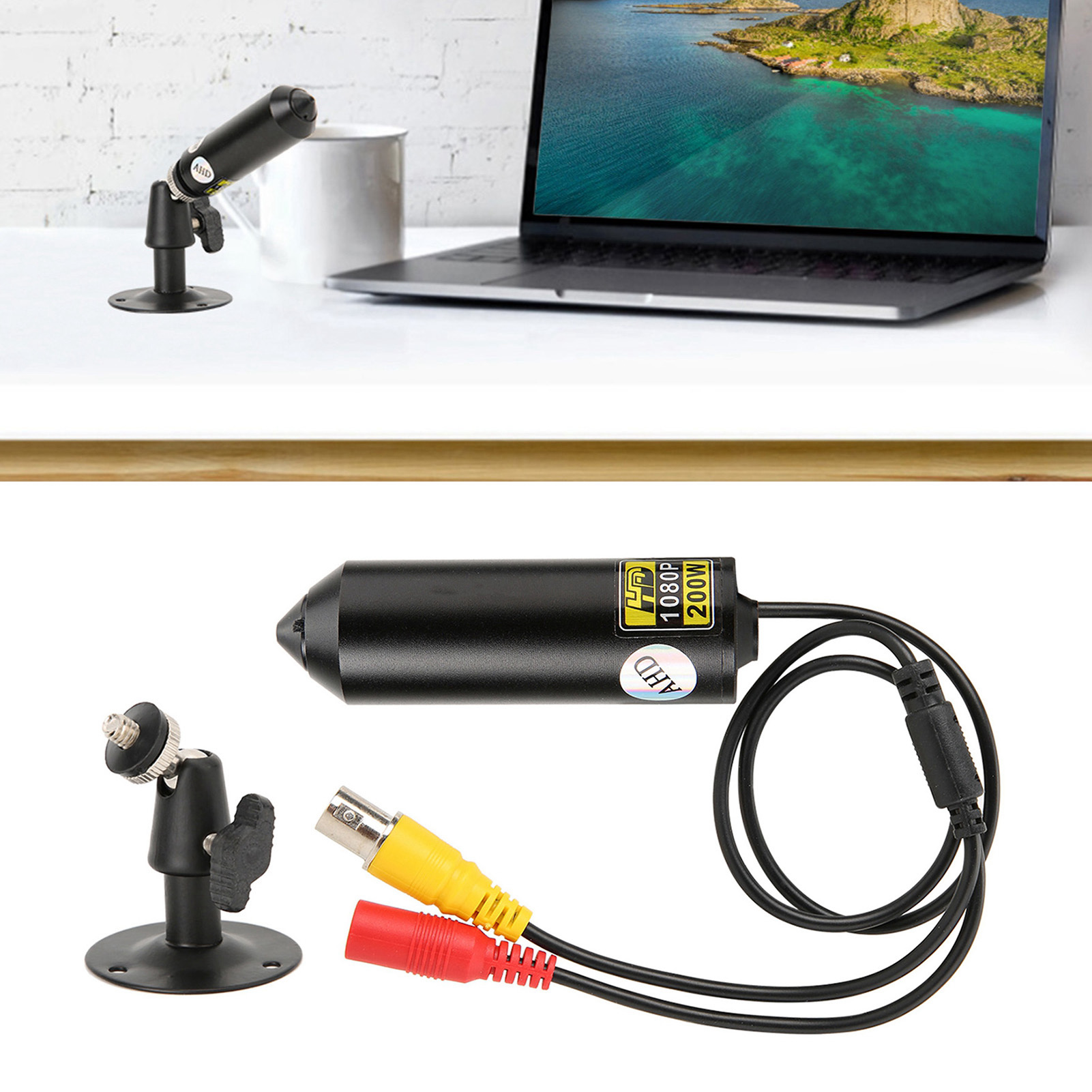 Kleine schwarze Überwachungskamera mit Kabeln und Halterung. Sie ist auf einen Laptop-Bildschirm gerichtet.
