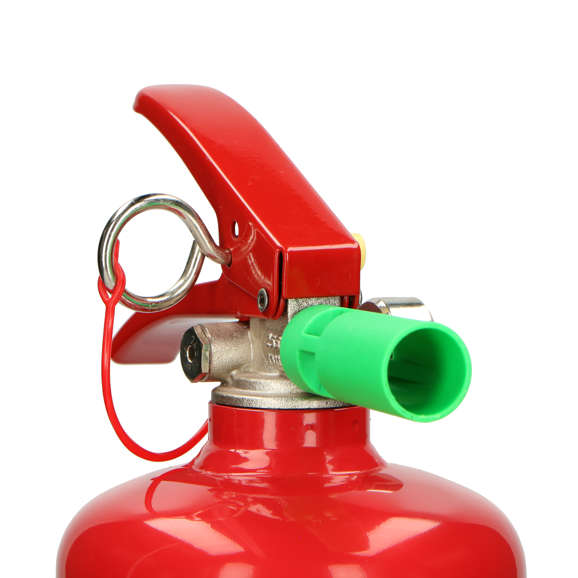 Red fire extinguisher. Red handle and green nozzle. Close-up view of the top part.