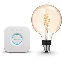 MediaMarkt PHILIPS HUE Starterspakket E27 met 2 Filament Edisonlampen Groot (ST72) Amber - Incl. 1 Hue Bridge, Hue White aanbieding