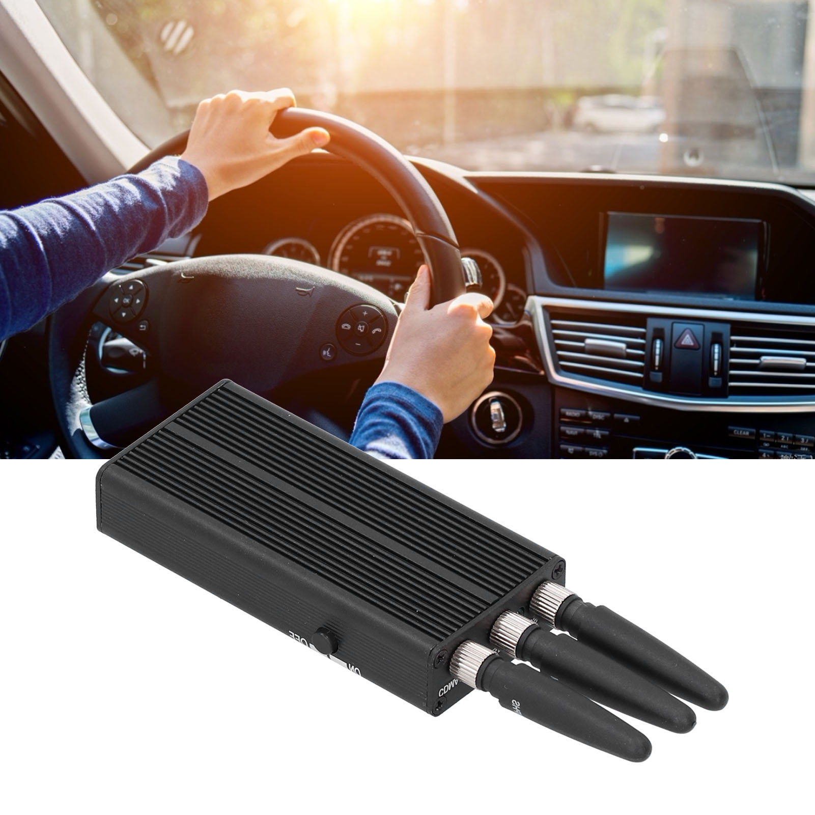 Ein schwarzes Gerät mit Antennen, Hände am Lenkrad und ein Autoinnenraum.