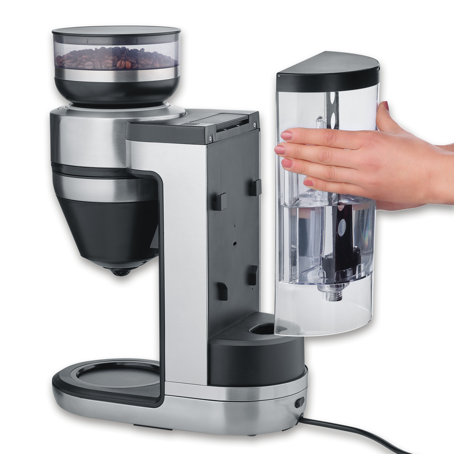 Coffee machine with beans and water tank, being filled by a hand.