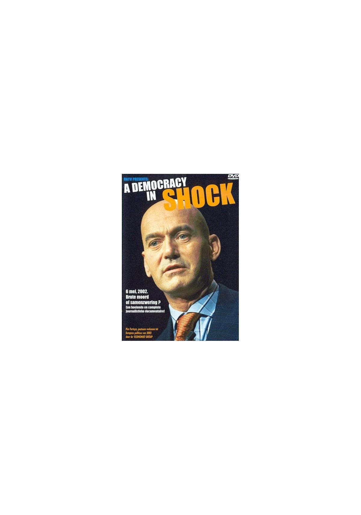 Pochette DVD : Homme chauve. Le texte dit 'A Democracy In Shock'.