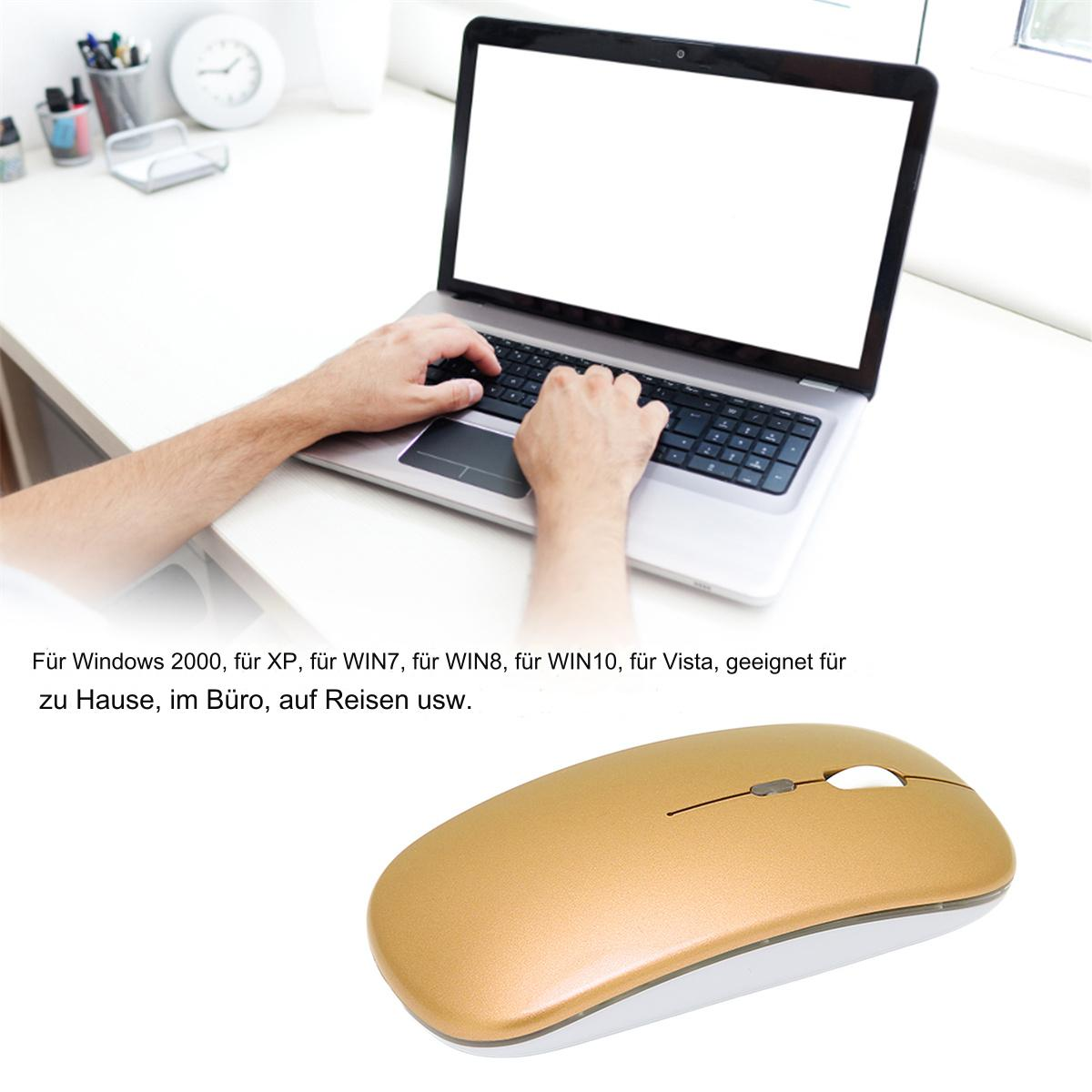 Eine Person tippt auf einem Laptop, darunter eine goldfarbene Maus.