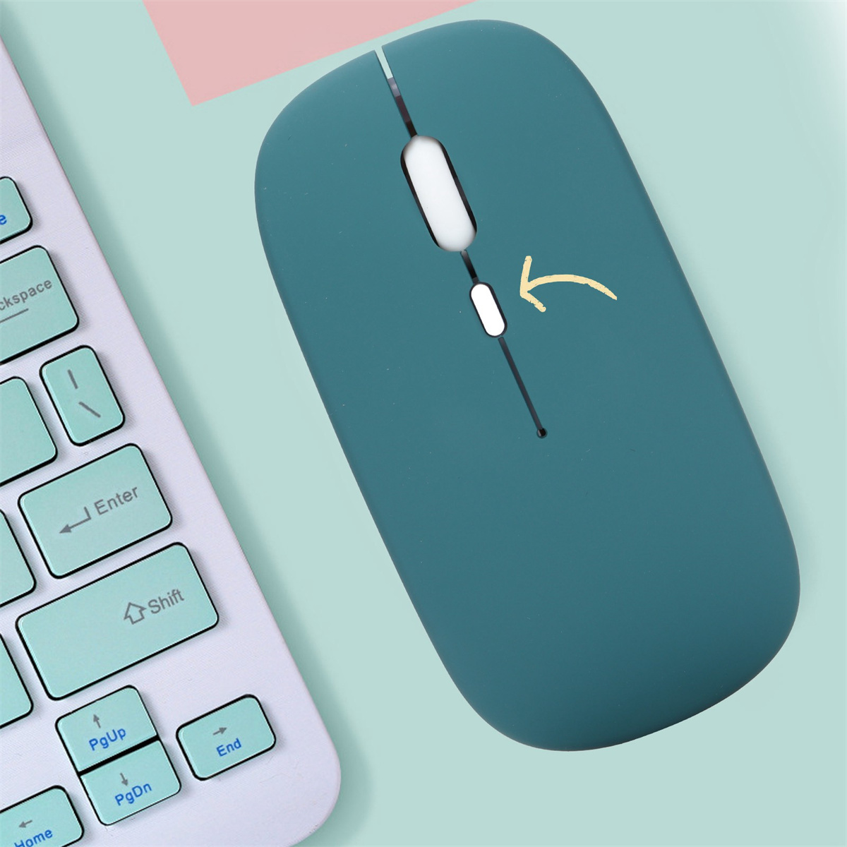 Türkis kabellose Maus mit Tastatur, Pfeil zeigt auf eine Taste.