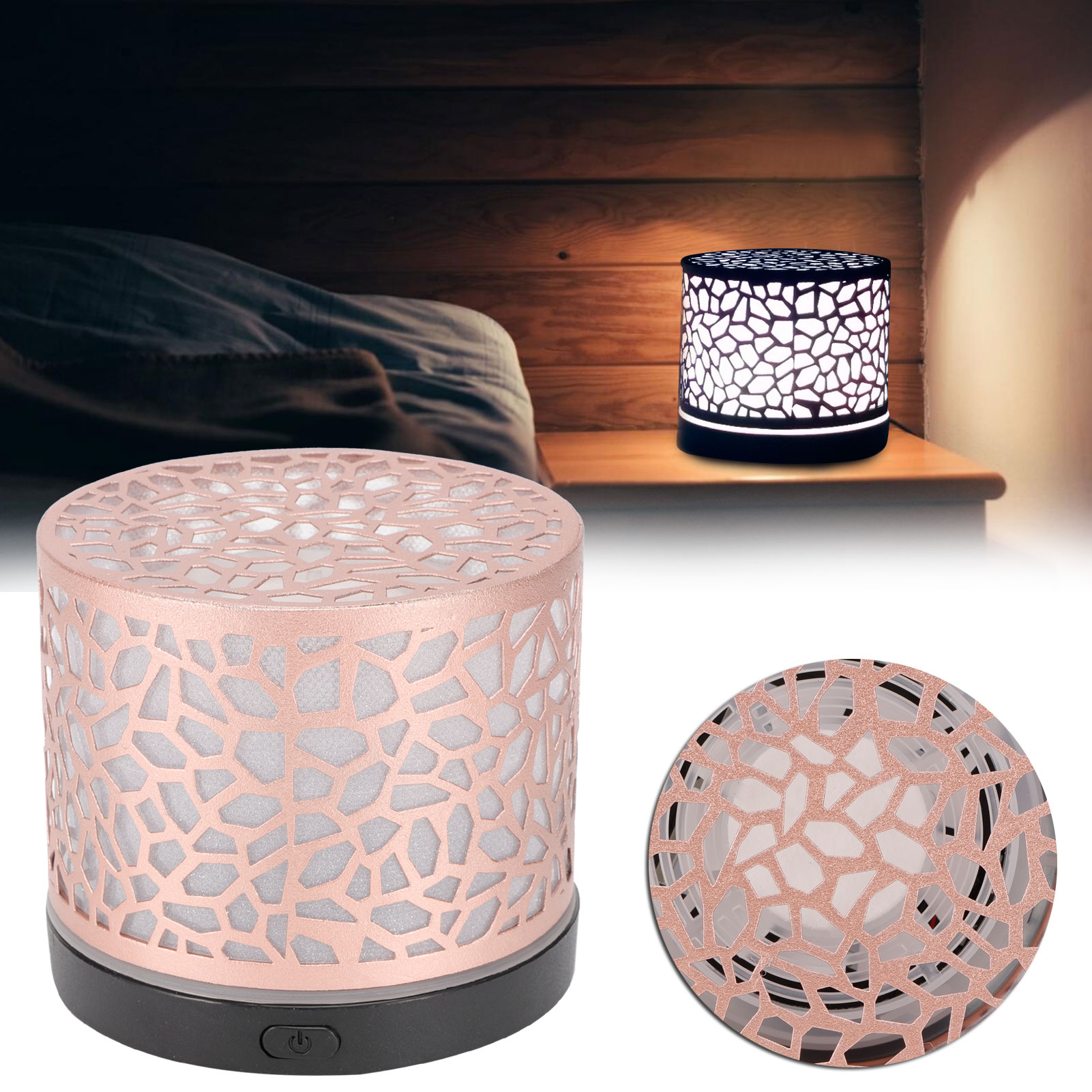 Eine roségoldene dekorative Lampe mit gemustertem Schirm. Eine andere Lampe steht auf einem Nachttisch. Dunkler Hintergrund.