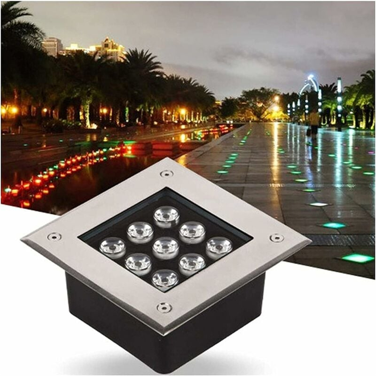 Eine quadratische, metallische LED-Leuchte in einem Gehweg mit Lichtern im Hintergrund.