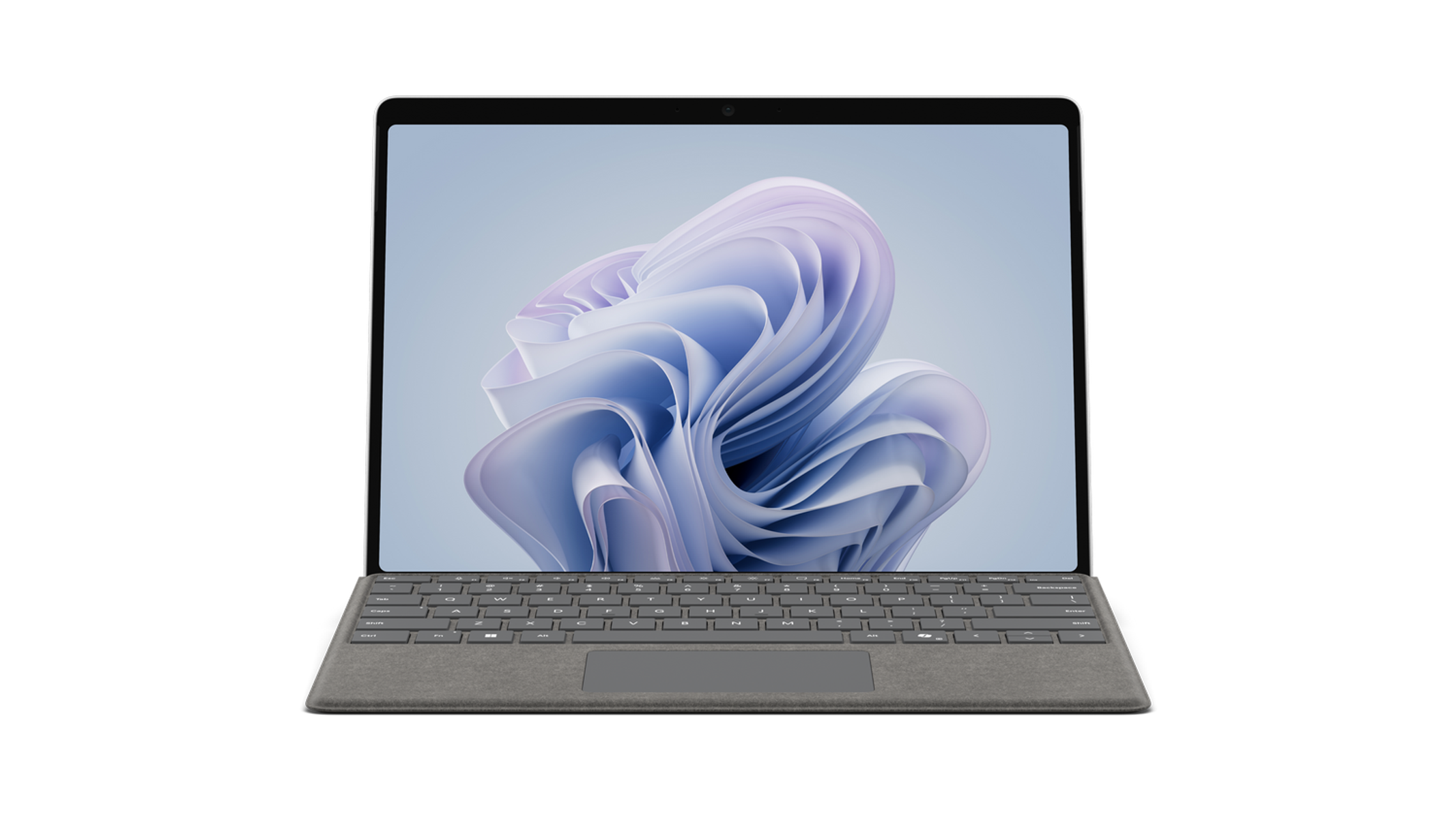Laptop con tastiera, lo schermo mostra un design viola e blu a spirale.